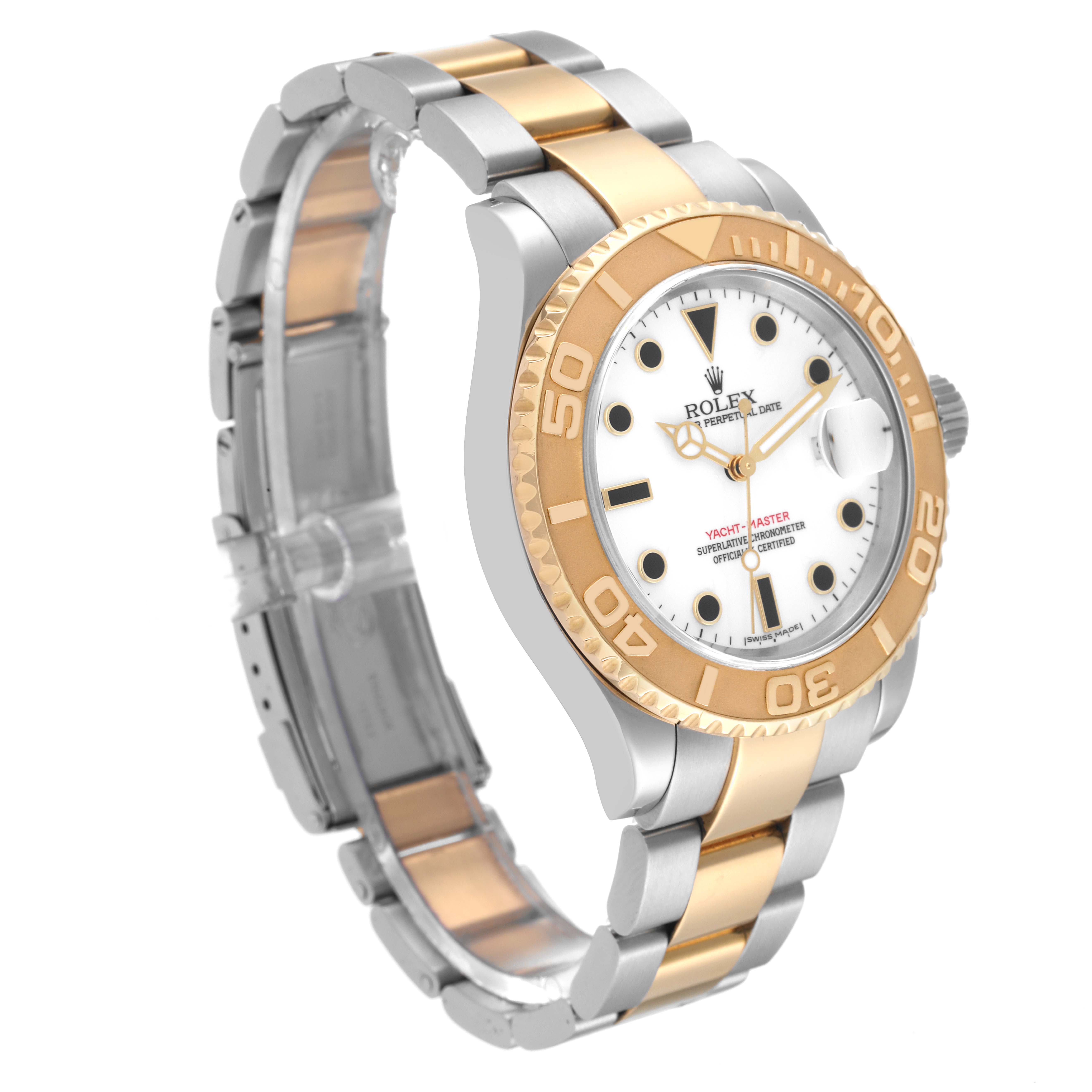 The Rolex Yacht-Master 16623 Men
s Steel and Gold (two tone) White Dial 16623 Men
s Steel and Gold (two tone) White Dial watch is shown at a three-quarter angle, displaying its bezel, dial, and part of the bracelet.