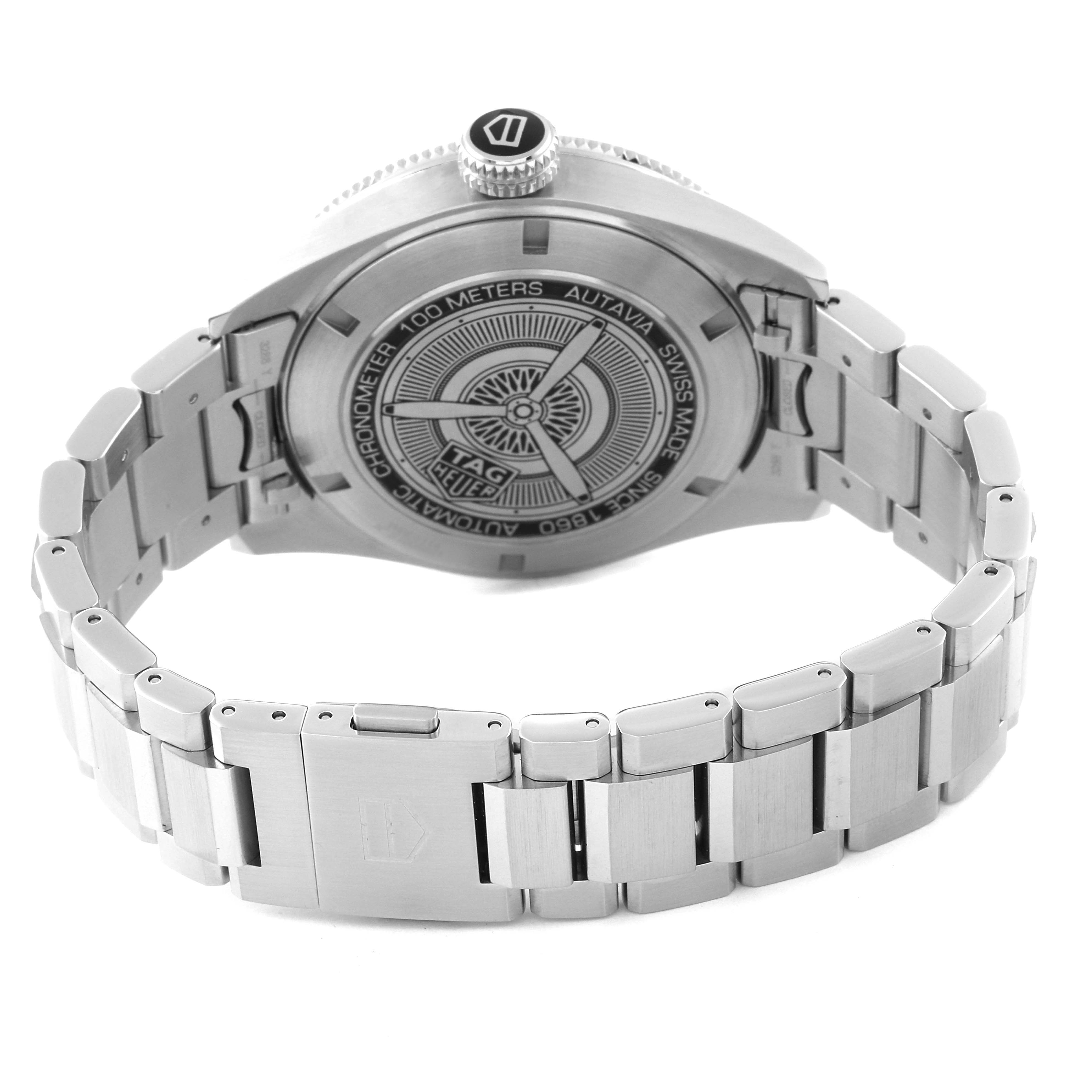 This image shows the back case and stainless steel bracelet of the Tag Heuer Autavia WBE5114.EB0173 Men's Stainless Steel Brown Dial WBE5114.EB0173 Men's Stainless Steel Brown Dial watch at an angle.