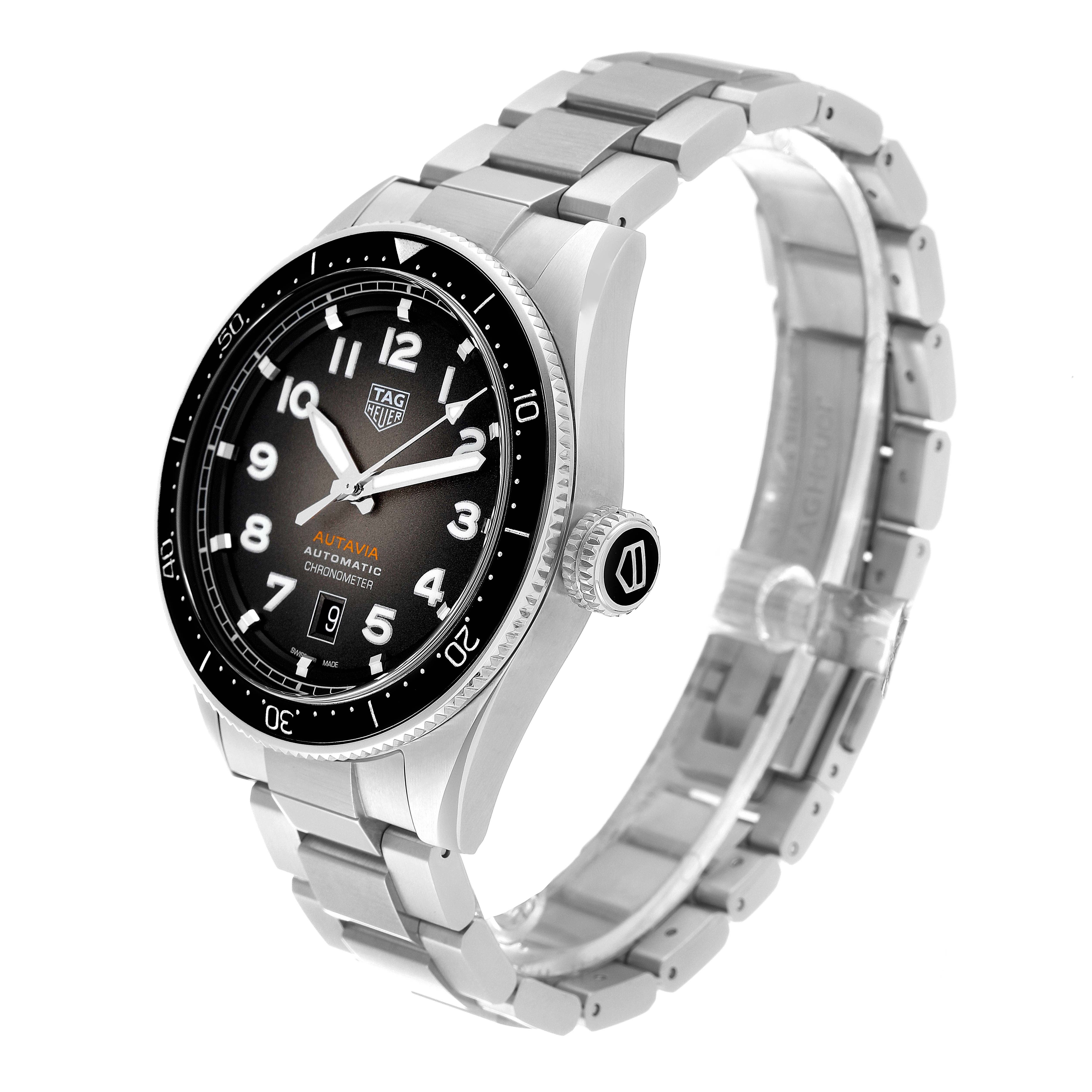 This image shows a side angle of the Tag Heuer Autavia WBE5114.EB0173 Men's Stainless Steel Brown Dial WBE5114.EB0173 Men's Stainless Steel Brown Dial watch, highlighting the face, bezel, crown, and metal bracelet.