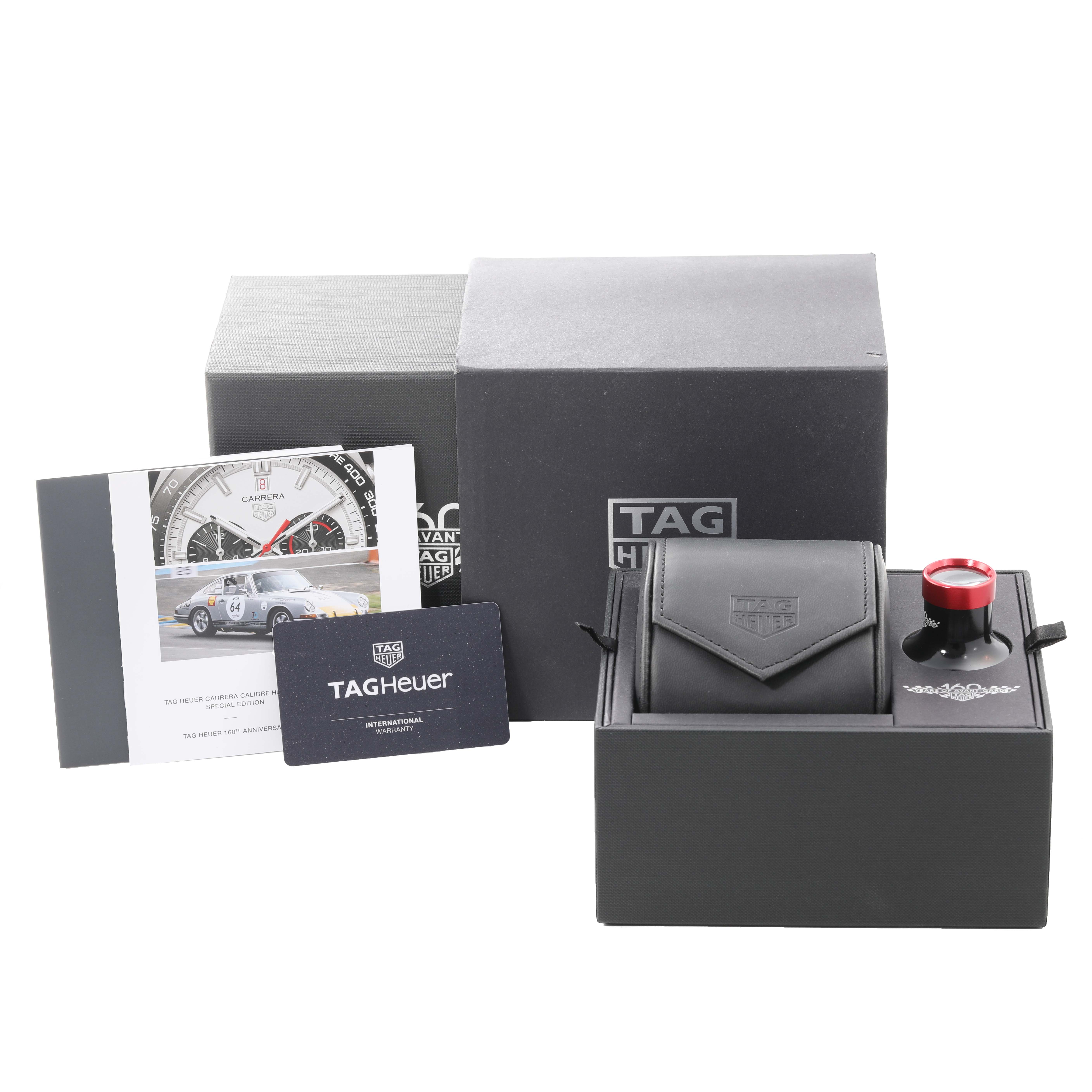 The image shows the packaging, warranty card, manual, and outer box for a Tag Heuer Carrera CBN2A1D.BA0643 Men's Stainless Steel Silver Dial CBN2A1D.BA0643 Men's Stainless Steel Silver Dial watch model.