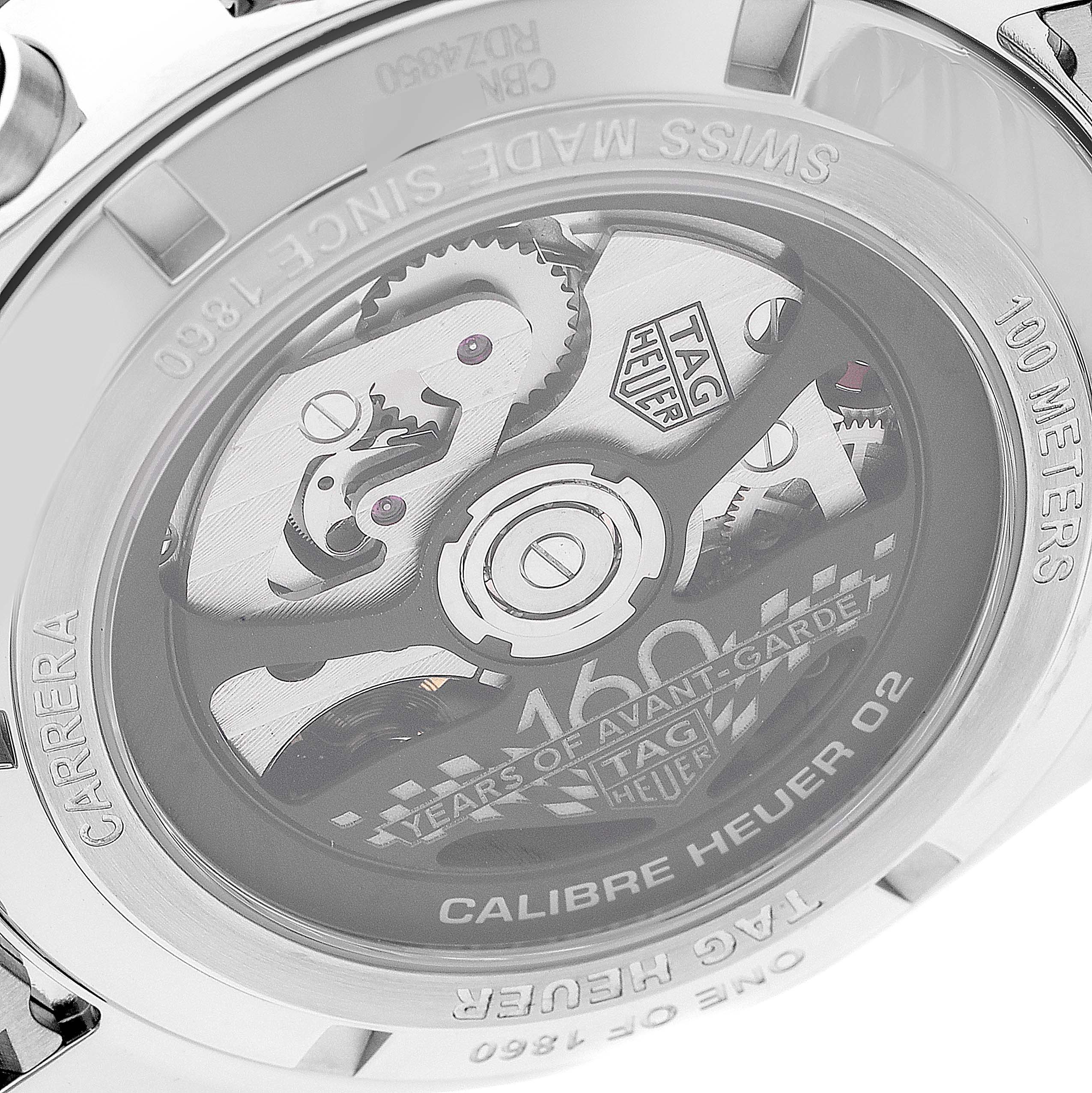 The image shows the back view of the Tag Heuer Carrera CBN2A1D.BA0643 Men's Stainless Steel Silver Dial CBN2A1D.BA0643 Men's Stainless Steel Silver Dial watch, highlighting the Calibre Heuer 02 movement.