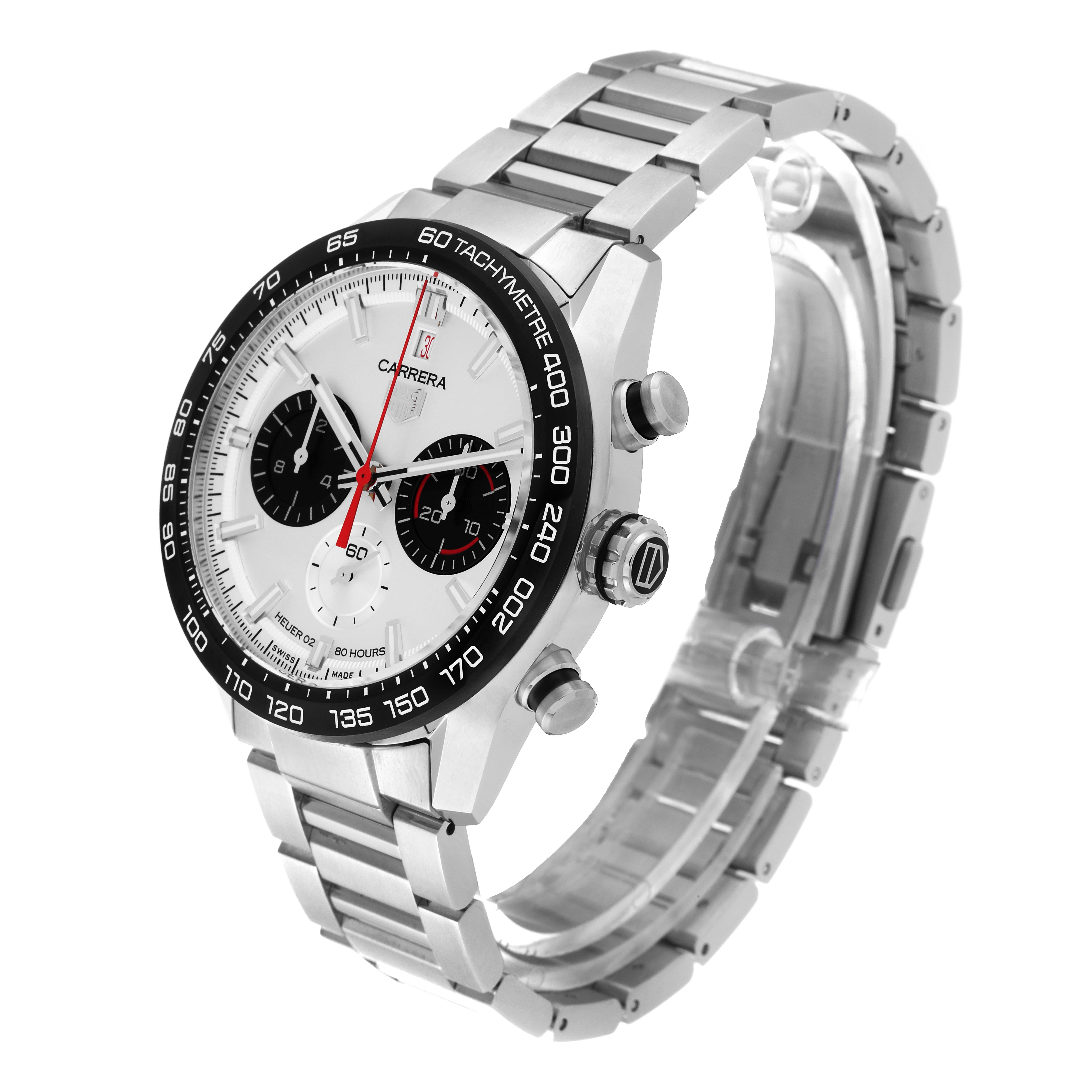 The image shows a Carrera model by Tag Heuer at a slight side angle, featuring the dial, bezel, and stainless steel bracelet.