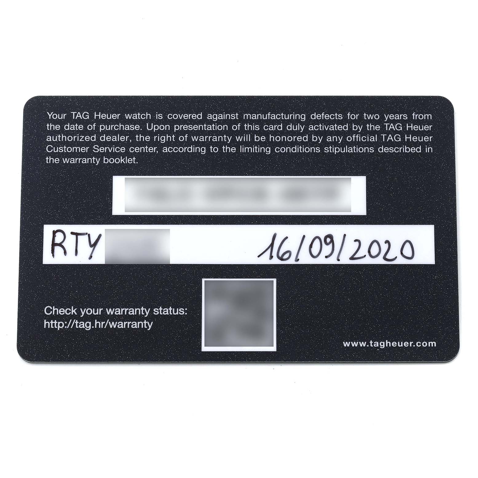 The image shows a Tag Heuer warranty card for the Carrera model, displaying warranty information and a date.