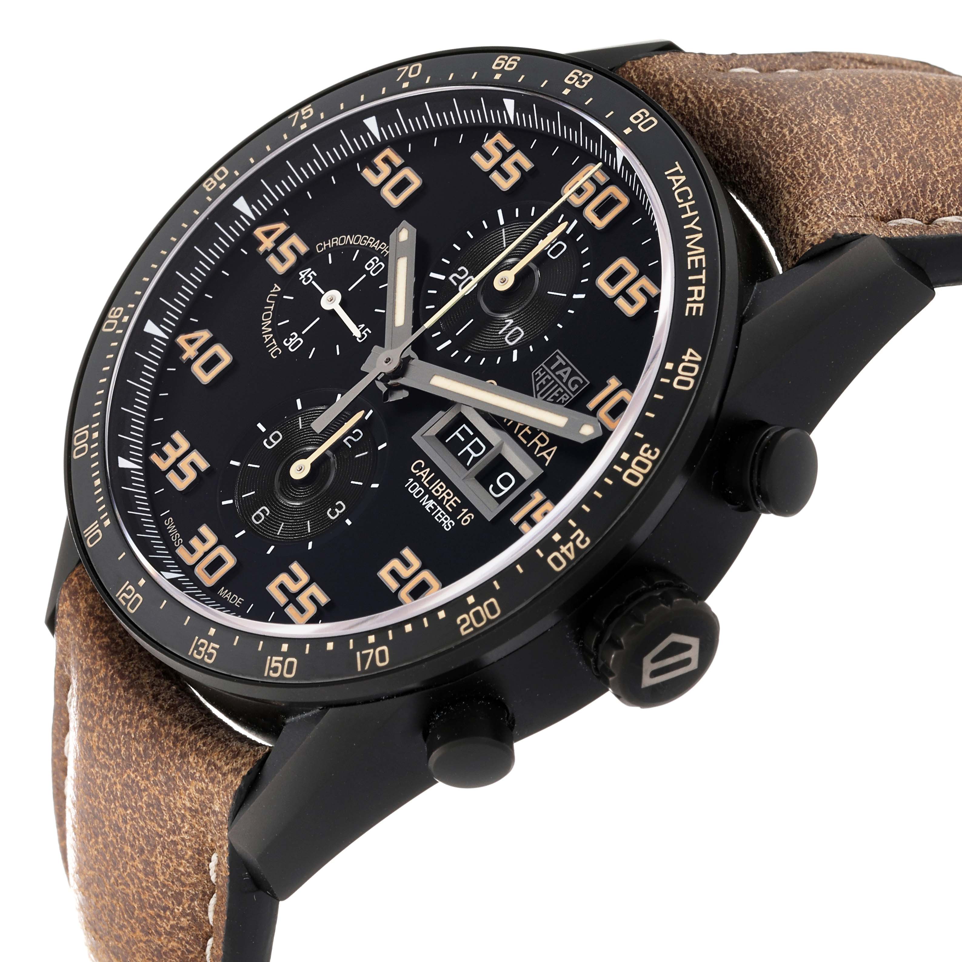 This Tag Heuer Carrera CV2A84.FC6394 Men's Titanium Black Dial CV2A84.FC6394 Men's Titanium Black Dial watch is shown at an angled close-up, highlighting its black dial, brown leather strap, and chronograph features.