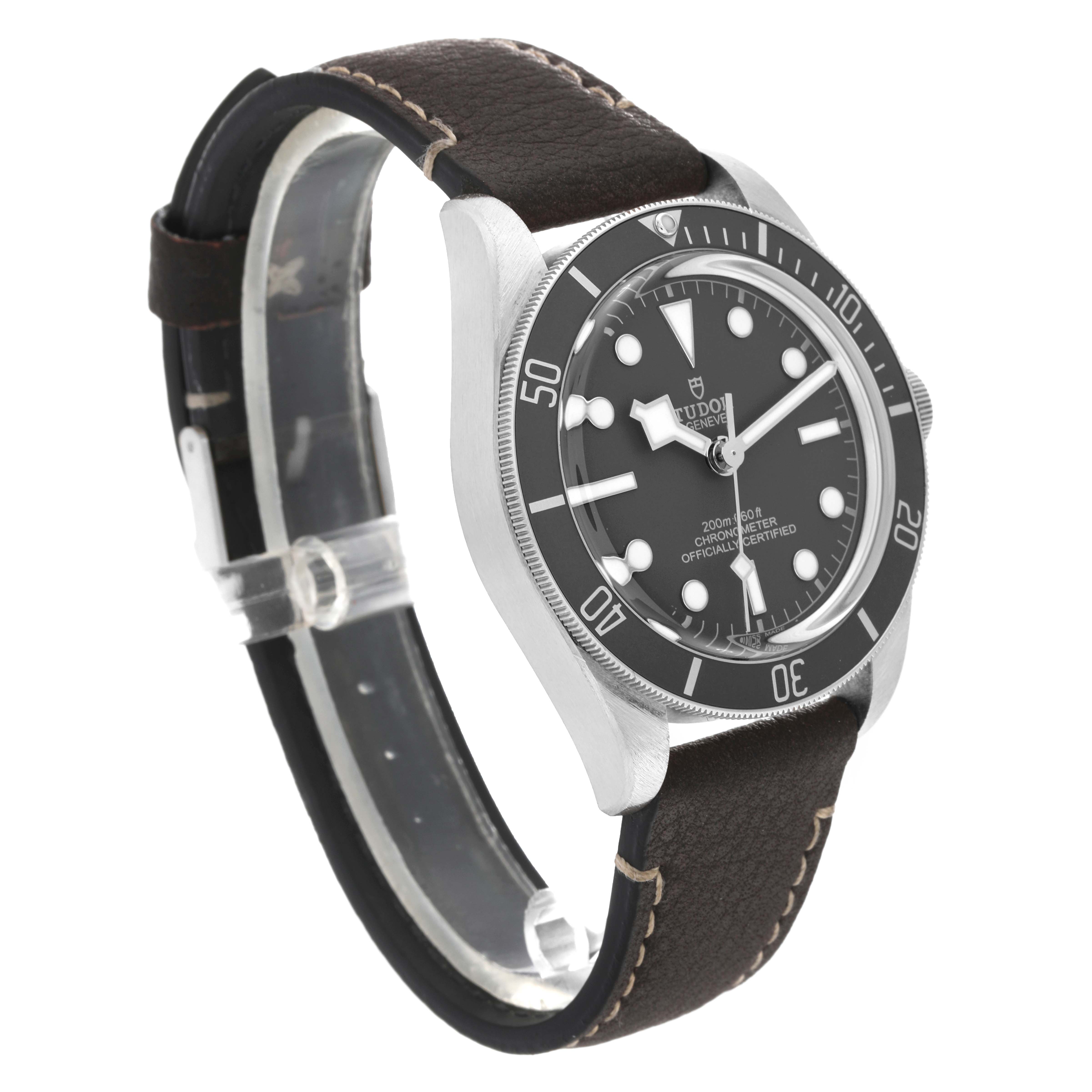 The Tudor Heritage Black Bay M79010SG-0002 Men's Stainless Steel Grey Dial M79010SG-0002 Men's Stainless Steel Grey Dial watch is shown at a three-quarter angle displaying the face, bezel, and leather strap.