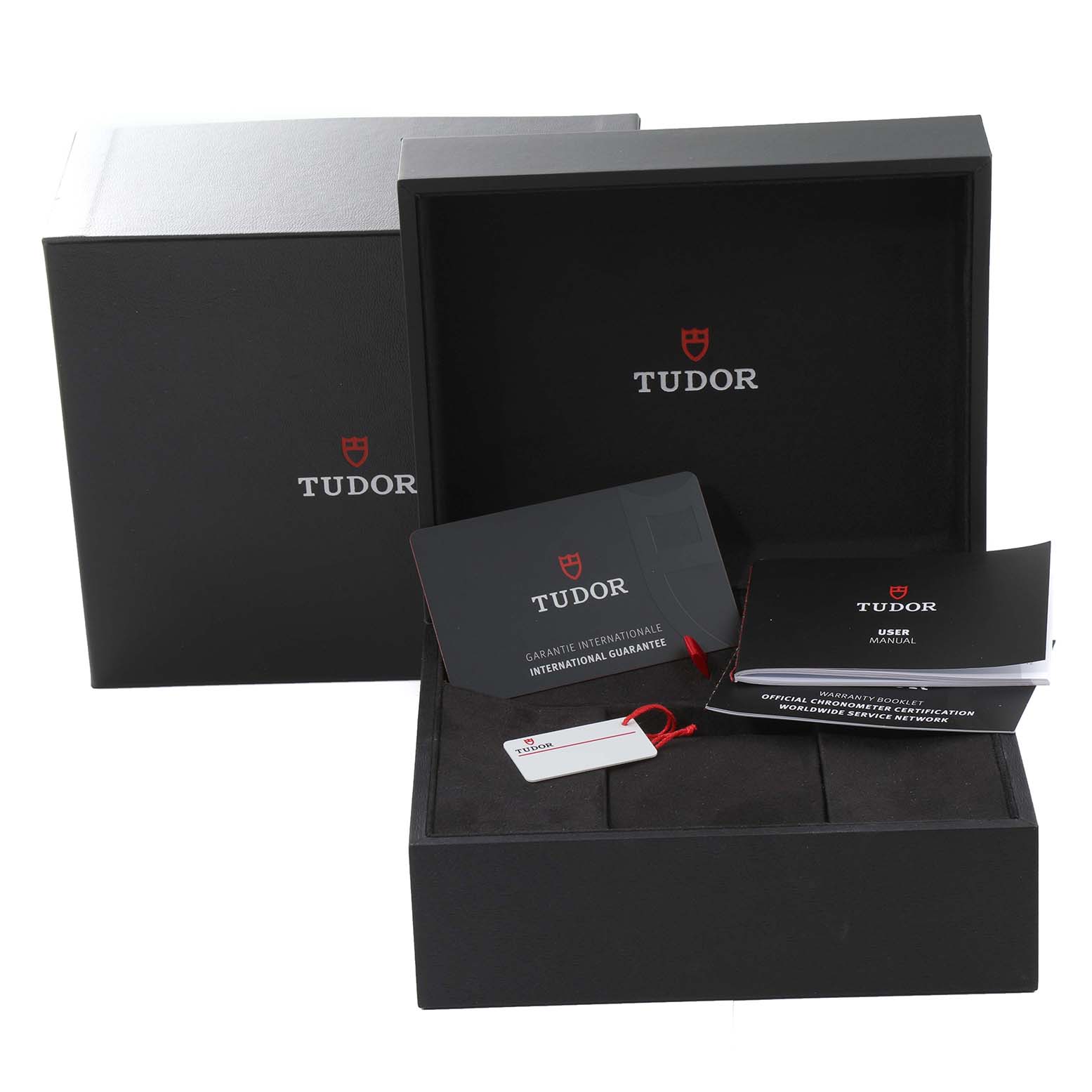 The image shows Tudor Heritage Black Bay M79010SG-0002 Men's Stainless Steel Grey Dial M79010SG-0002 Men's Stainless Steel Grey Dial packaging, including the box, manuals, and guarantee card, viewed from the front.