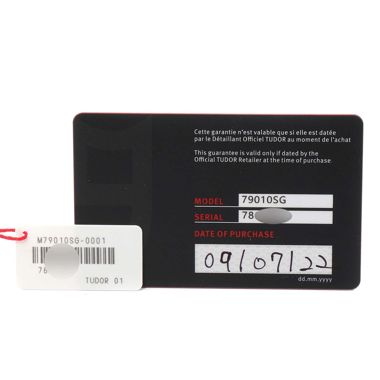 The image shows the warranty card for a Tudor Heritage Black Bay M79010SG-0002 Men's Stainless Steel Grey Dial M79010SG-0002 Men's Stainless Steel Grey Dial watch model 79010SG.