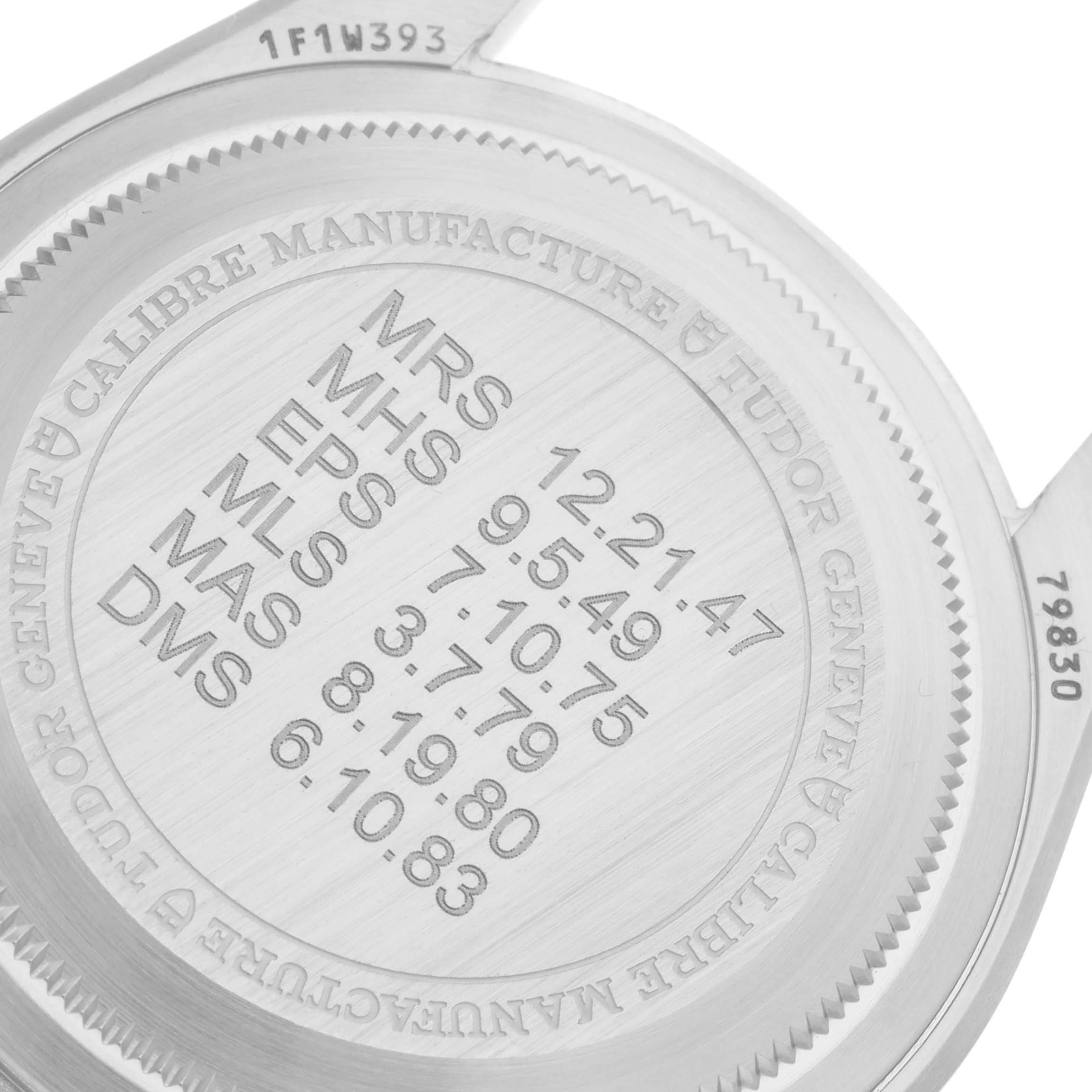 This image shows the engraved case back of a Tudor Heritage Black Bay 79830RB Men's Stainless Steel Black Dial 79830RB Men's Stainless Steel Black Dial watch, including manufacturer details and reference numbers.