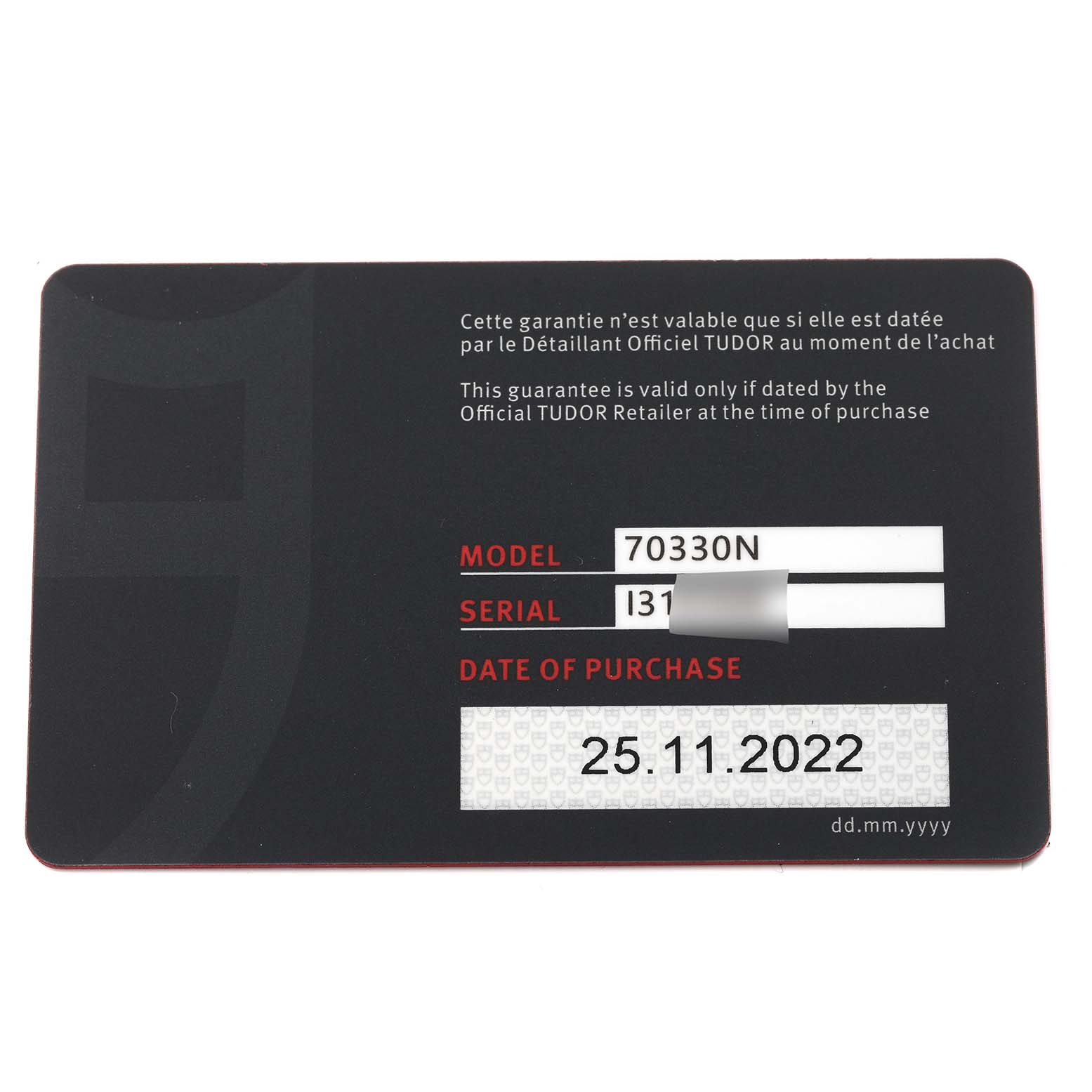 This image shows the guarantee card for the Tudor Heritage Chrono 70330N Men's Stainless Steel Grey Dial 70330N Men's Stainless Steel Grey Dial model 70330N, with details including the serial number and date of purchase.