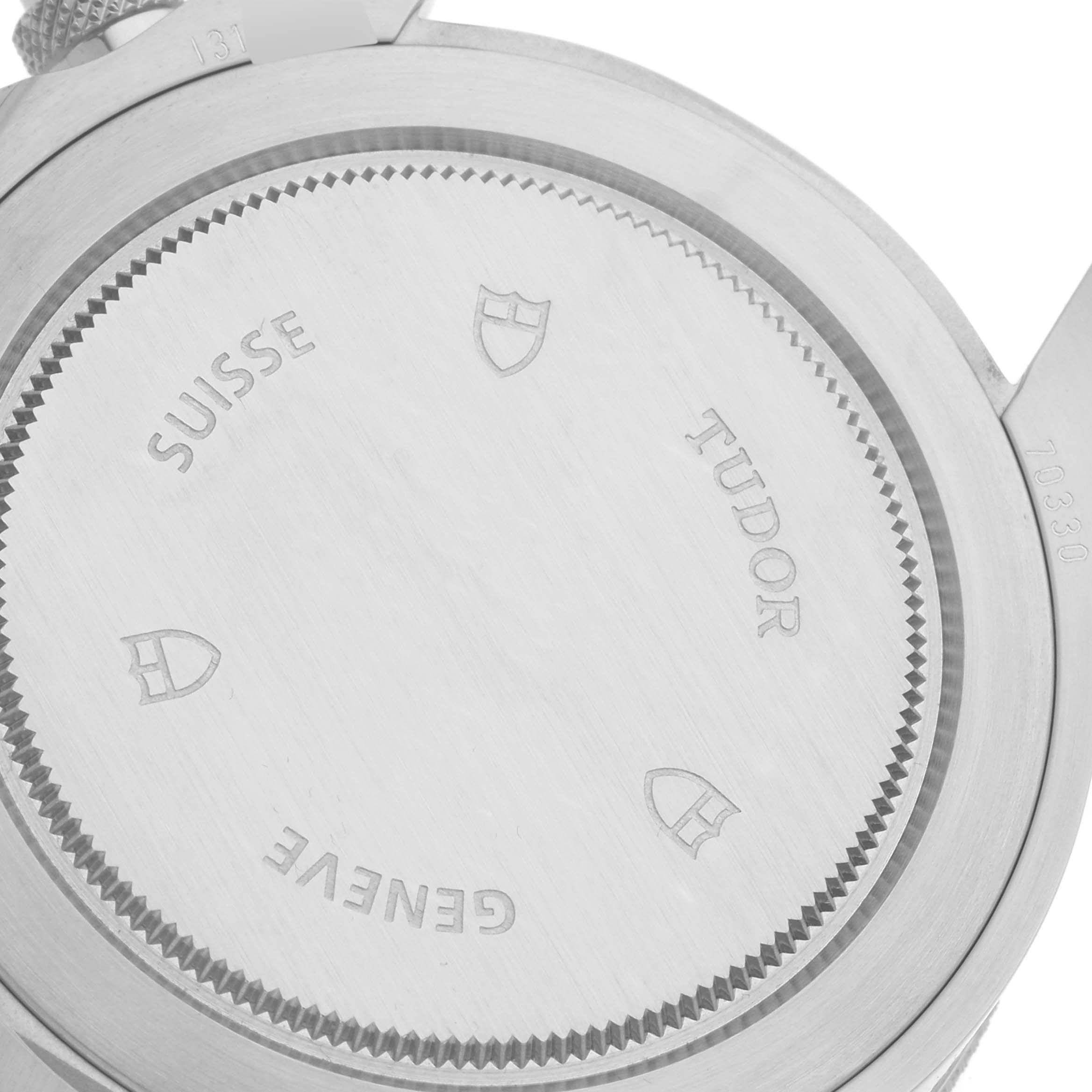 The image shows the back casing and serial number of the Tudor Heritage Chrono 70330N Men's Stainless Steel Grey Dial 70330N Men's Stainless Steel Grey Dial watch.