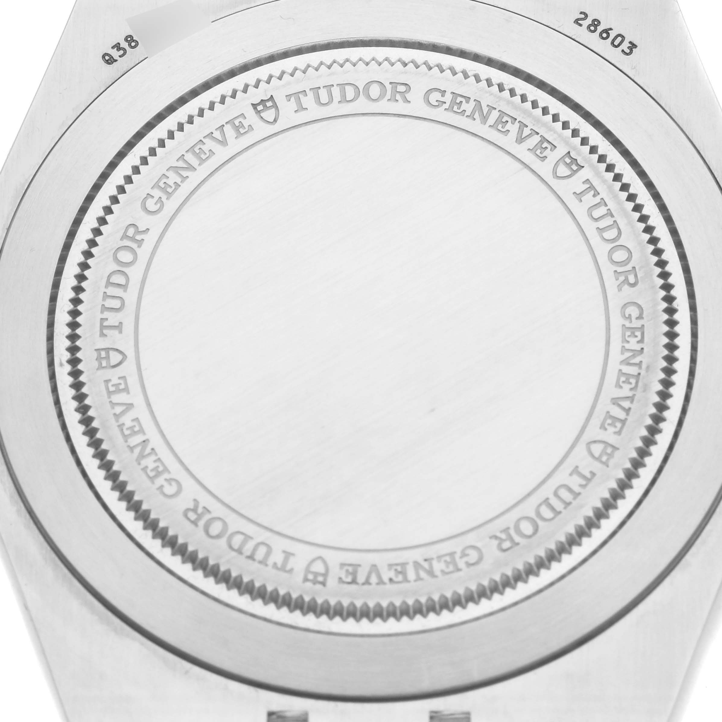 This is the back of the Tudor Royal 28603 Men's Steel and Gold (two tone) Champagne Dial 28603 Men's Steel and Gold (two tone) Champagne Dial watch model, displaying the caseback engraving.