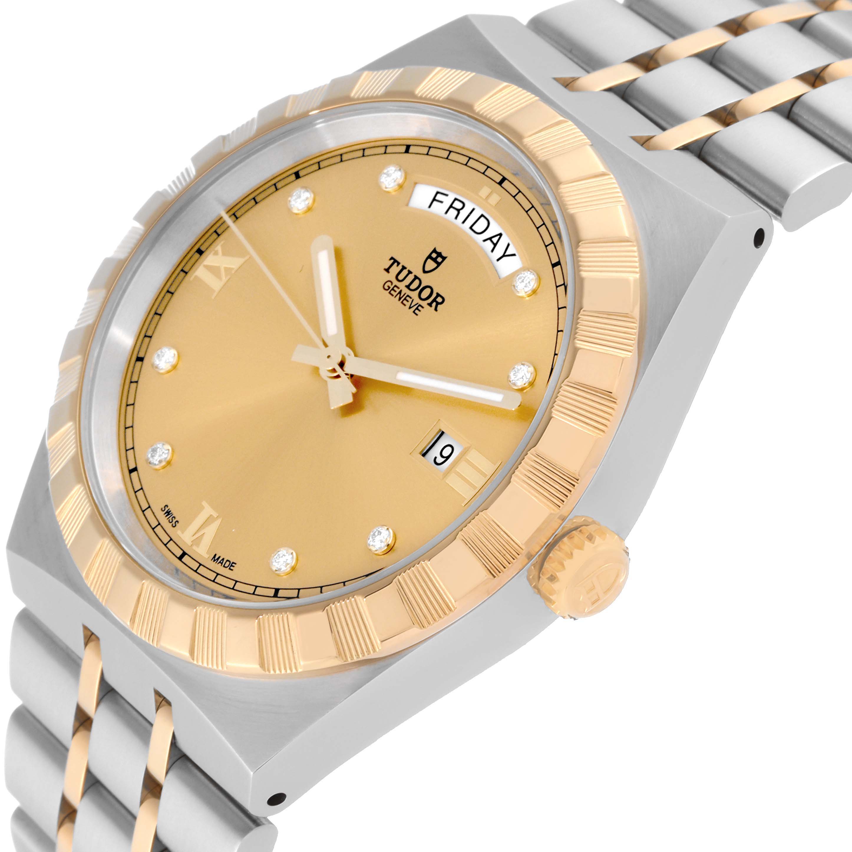 The image shows a close-up of the Tudor Royal 28603 Men's Steel and Gold (two tone) Champagne Dial 28603 Men's Steel and Gold (two tone) Champagne Dial watch's face, bezel, crown, and part of the bracelet at an angled view.