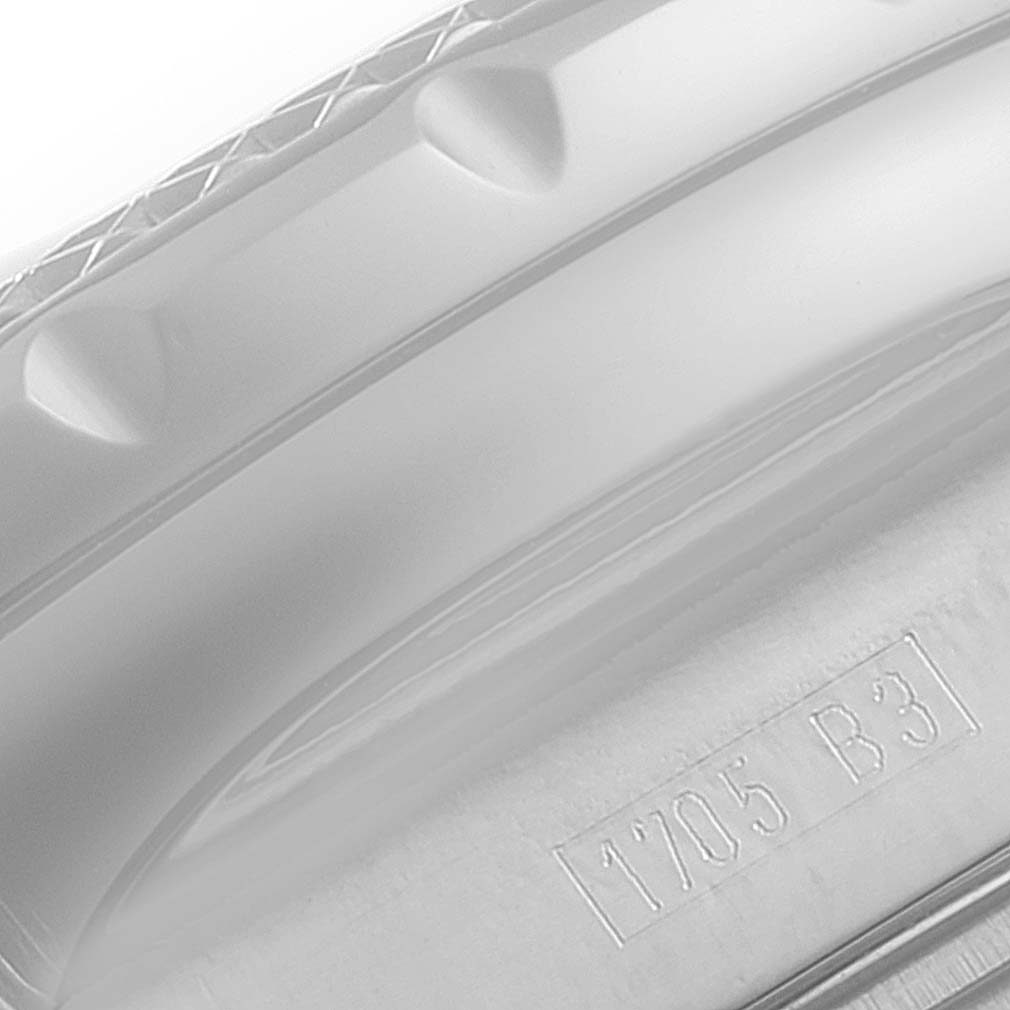 The image shows a close-up angle of the Breitling Bentley A13362 Men's Stainless Steel Blue Dial A13362 Men's Stainless Steel Blue Dial model watch, highlighting the engraved serial number and part of the bezel.