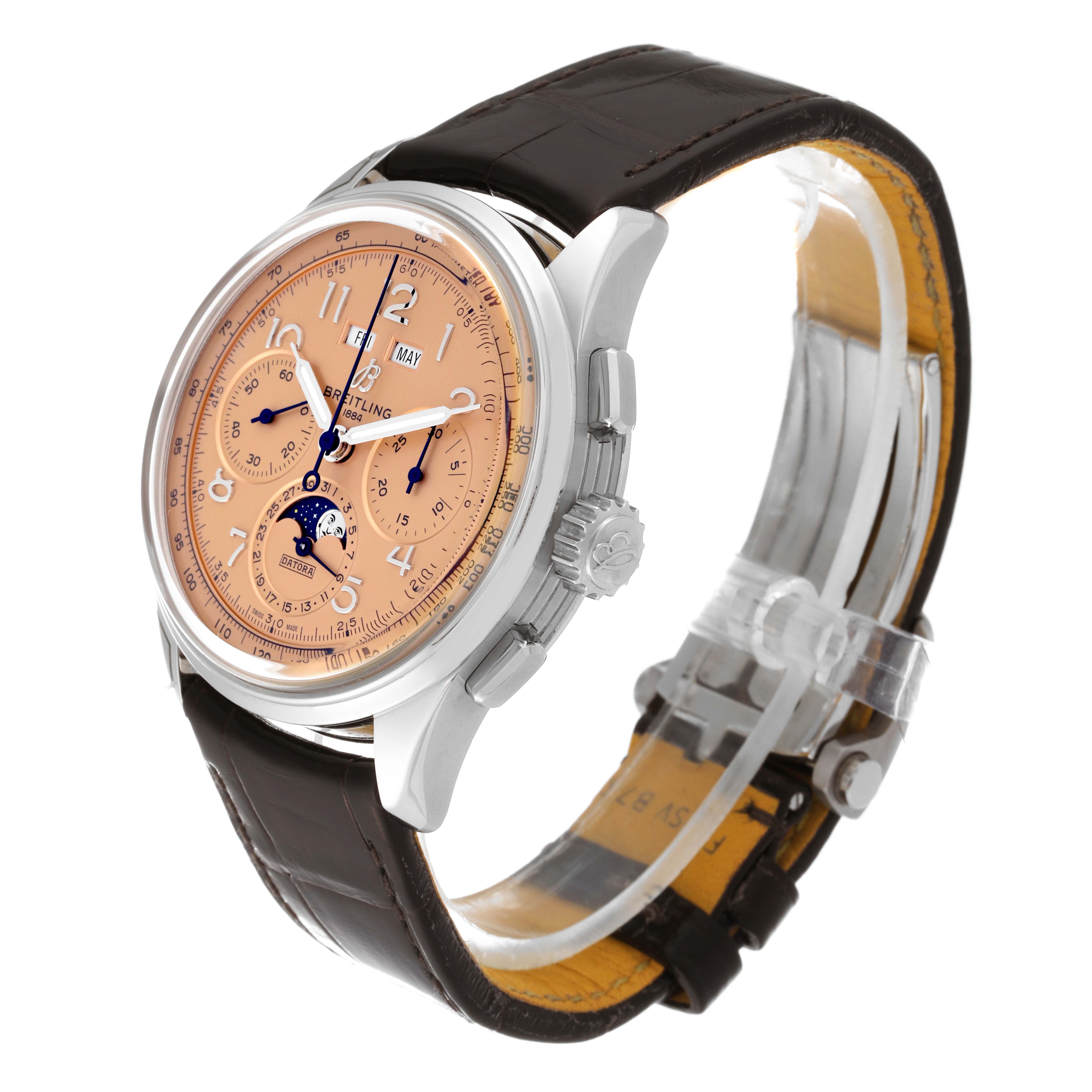 The Breitling Premier AB2510201K1P1 Men's Stainless Steel Pink Dial AB2510201K1P1 Men's Stainless Steel Pink Dial watch is shown at a slight angle, displaying the face, crown, pushers, and part of the leather strap.