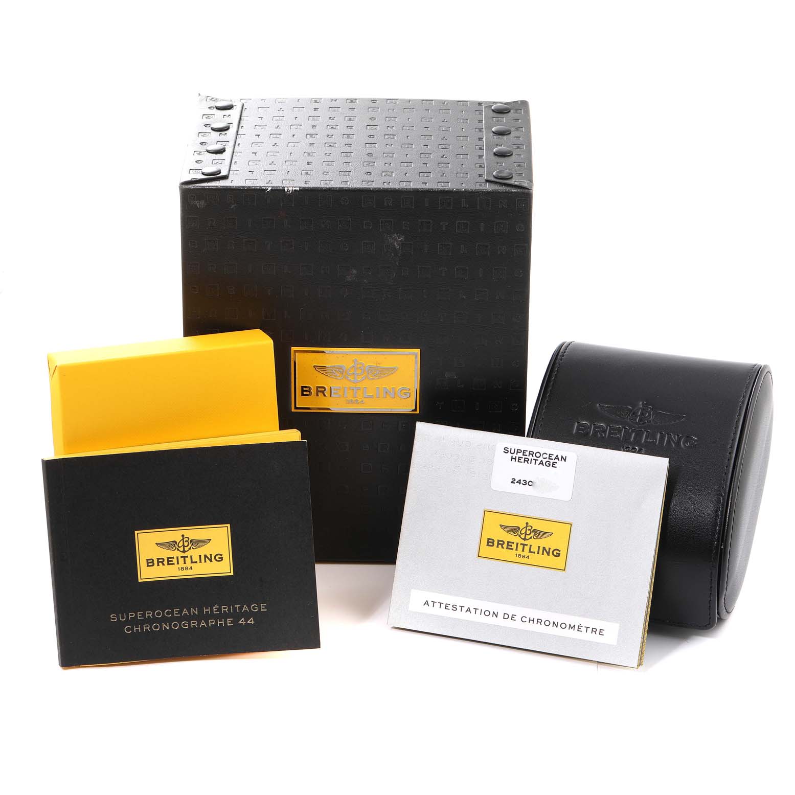 The image shows the packaging and accessories for the Breitling Superocean A23370 Men's Stainless Steel Black Dial A23370 Men's Stainless Steel Black Dial model, including boxes and certificates.