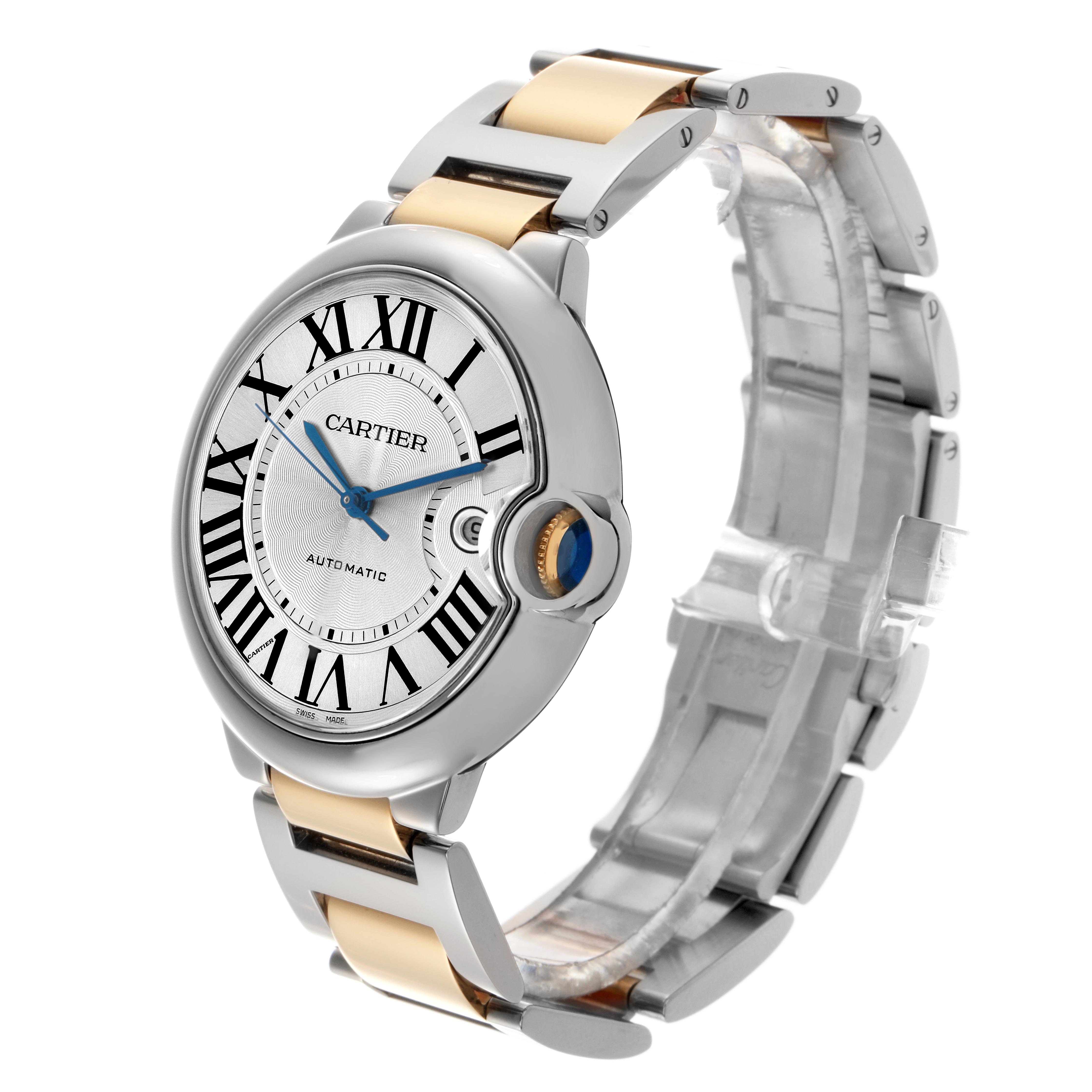 The Cartier Ballon Bleu W69009Z3 Men
s Steel and Gold (two tone) Silver Dial W69009Z3 Men
s Steel and Gold (two tone) Silver Dial watch is shown at a three-quarter angle, displaying its face, roman numerals, blue hands, and two-tone bracelet.
