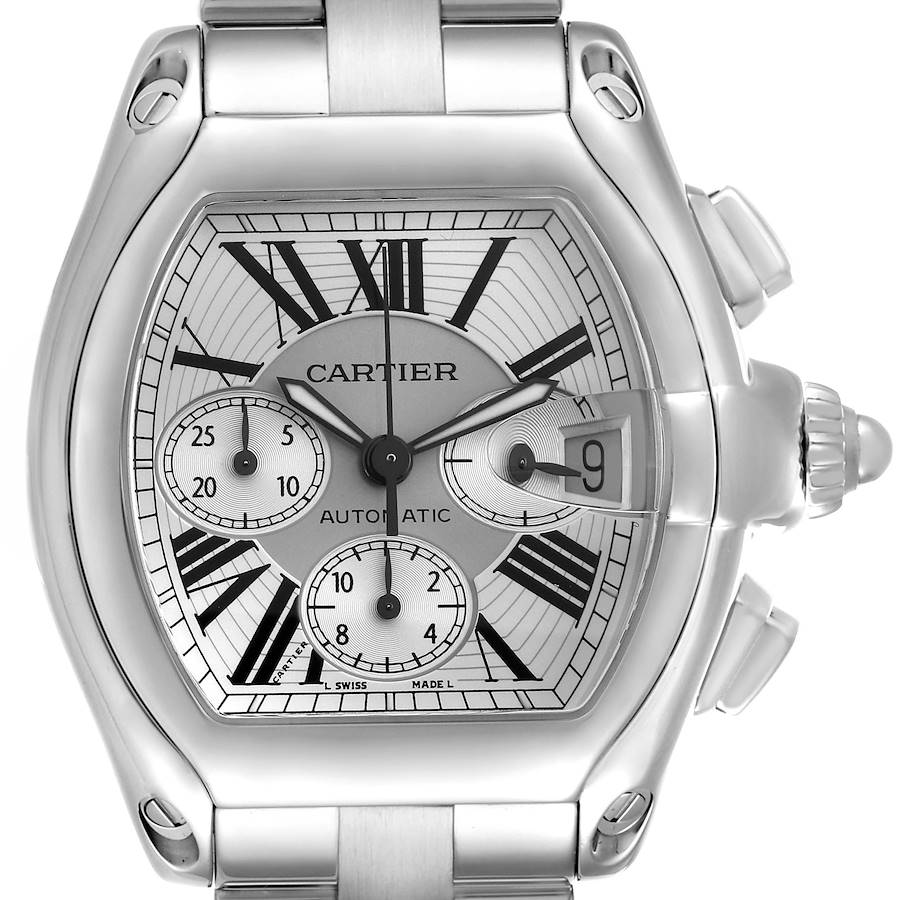 The Cartier Roadster watch is shown from the front, displaying its face, Roman numerals, subdials, and date window.