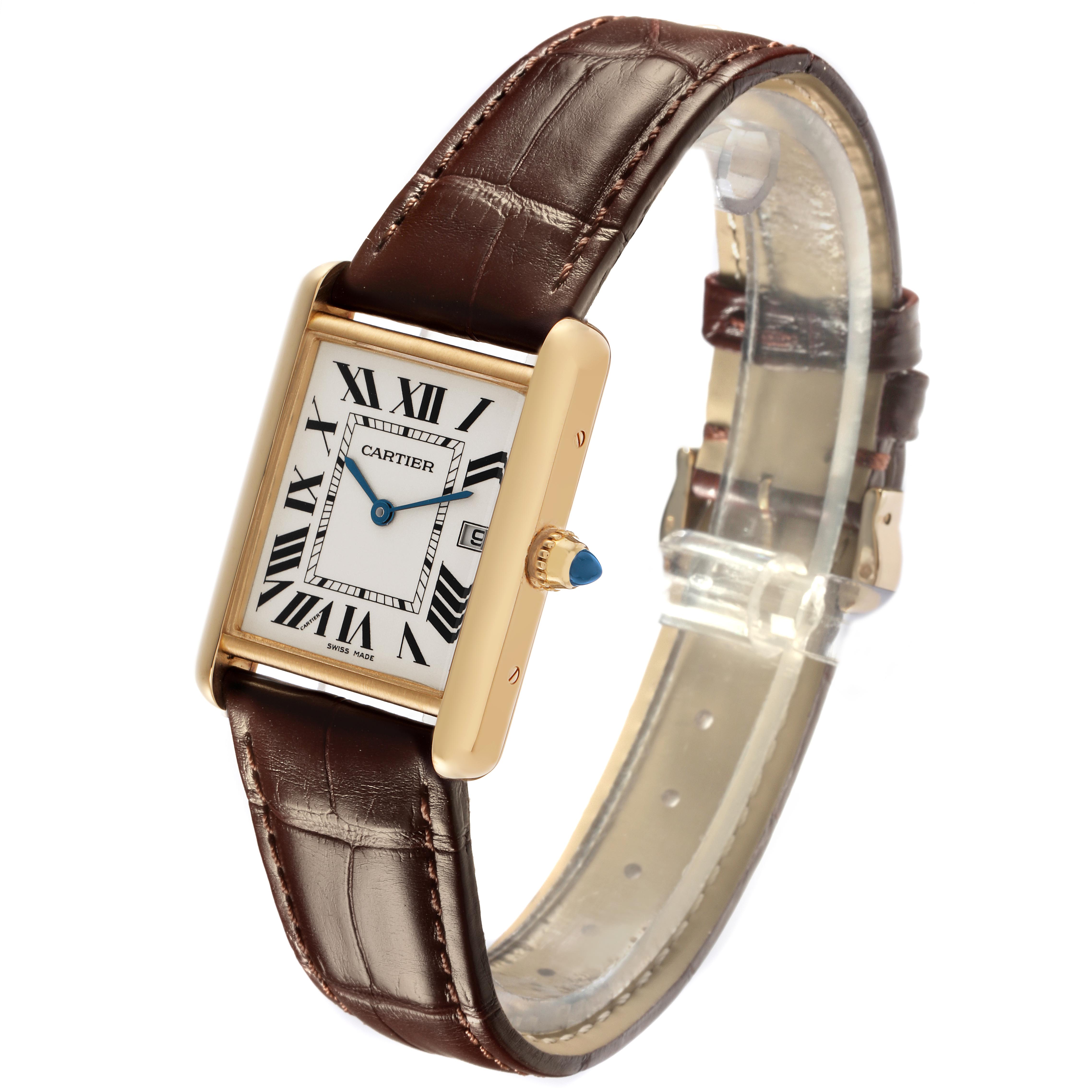 The Cartier Tank Louis W1529756 Men's Yellow Gold Silver Dial W1529756 Men's Yellow Gold Silver Dial watch is shown at a three-quarter angle, featuring its rectangular case, crown with blue cabochon, dial, and leather strap.