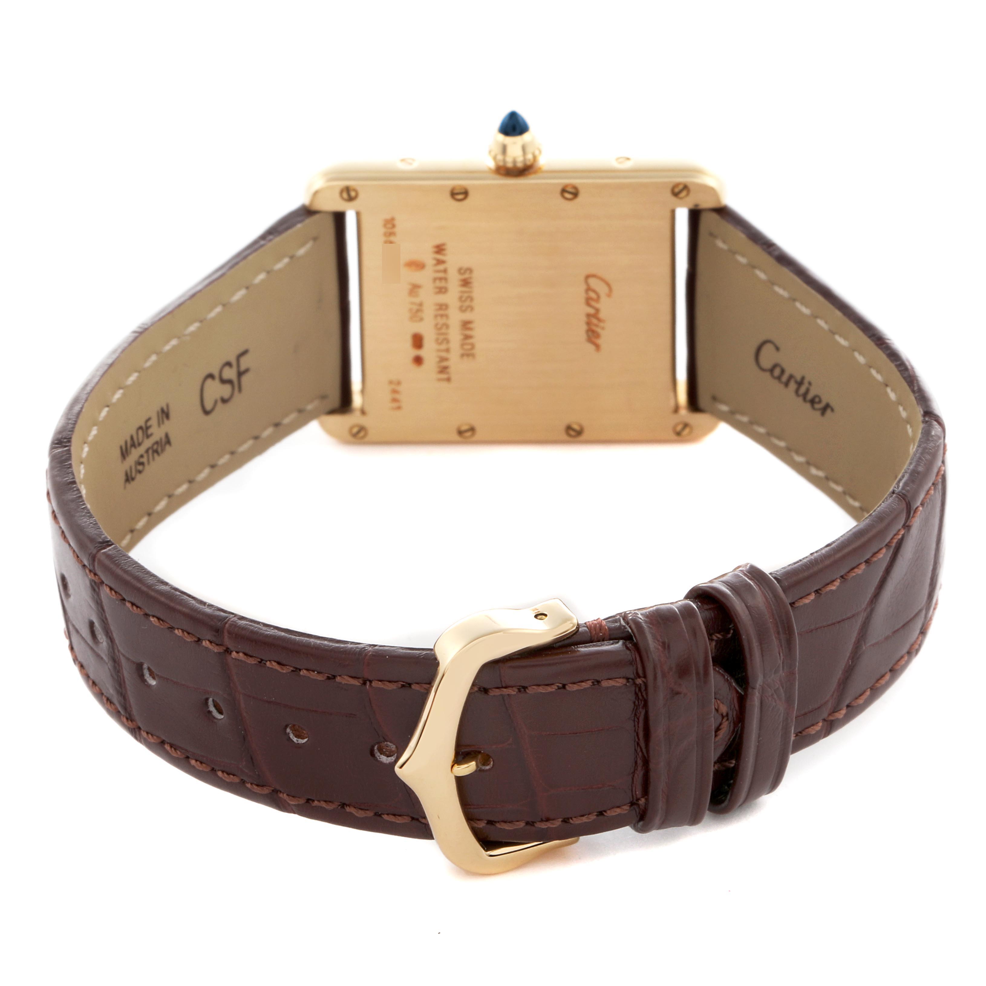 The image shows the back of a Cartier Tank Louis W1529756 Men's Yellow Gold Silver Dial W1529756 Men's Yellow Gold Silver Dial watch, highlighting the leather strap and gold buckle.