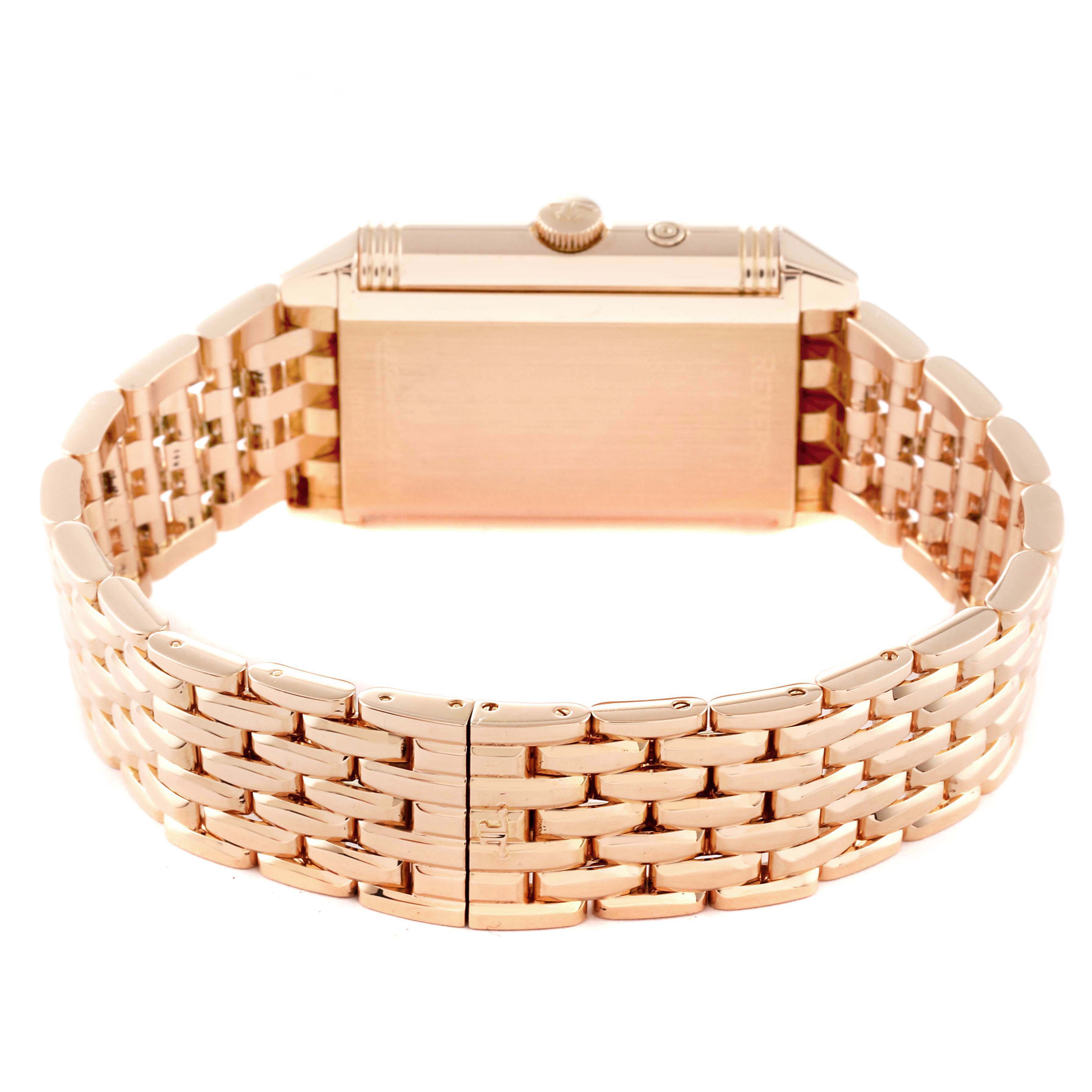 The image shows the back of a Jaeger-LeCoultre Reverso model watch, highlighting its bracelet and case.