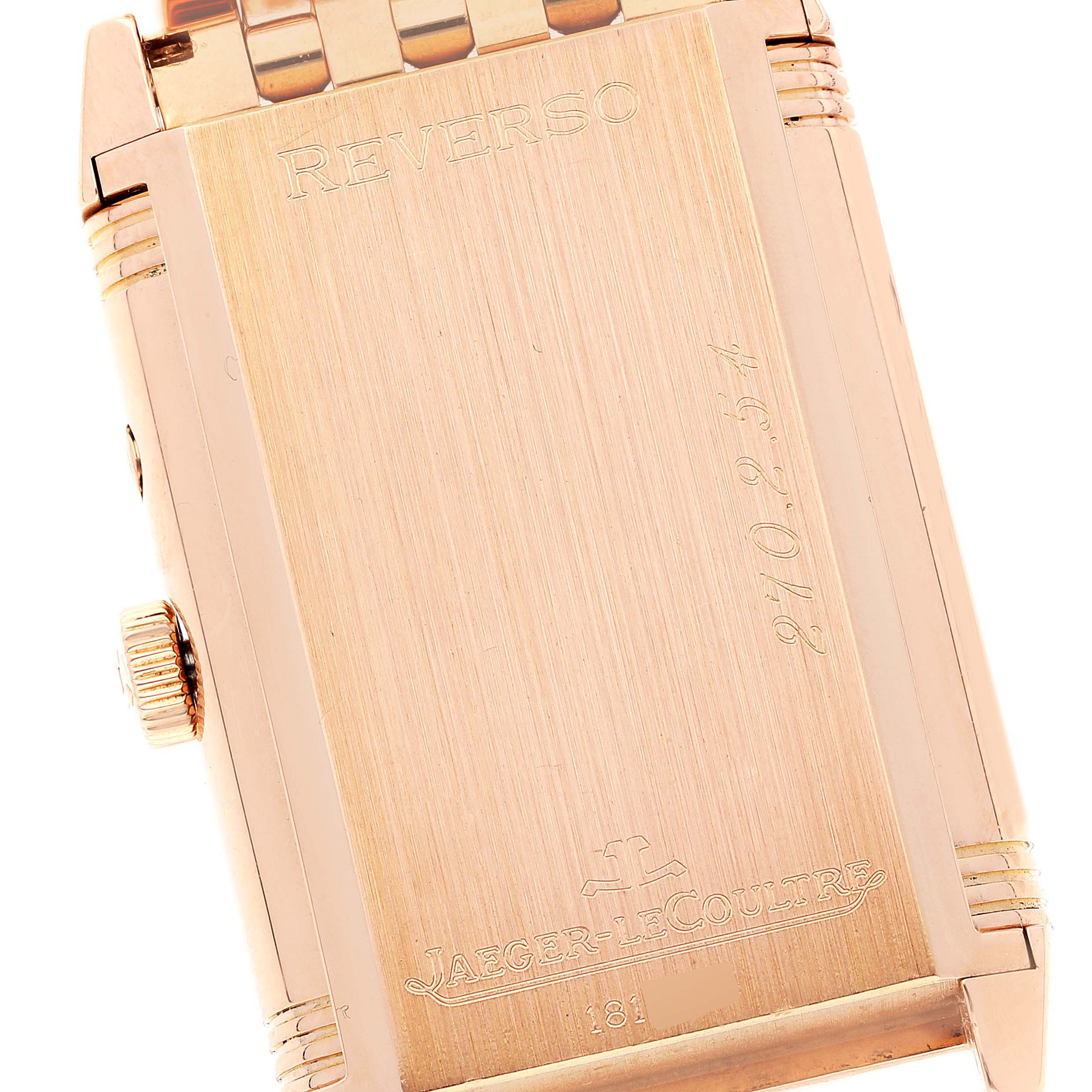 The image shows the back case of a Jaeger-LeCoultre Reverso watch, including the crown and part of the bracelet.