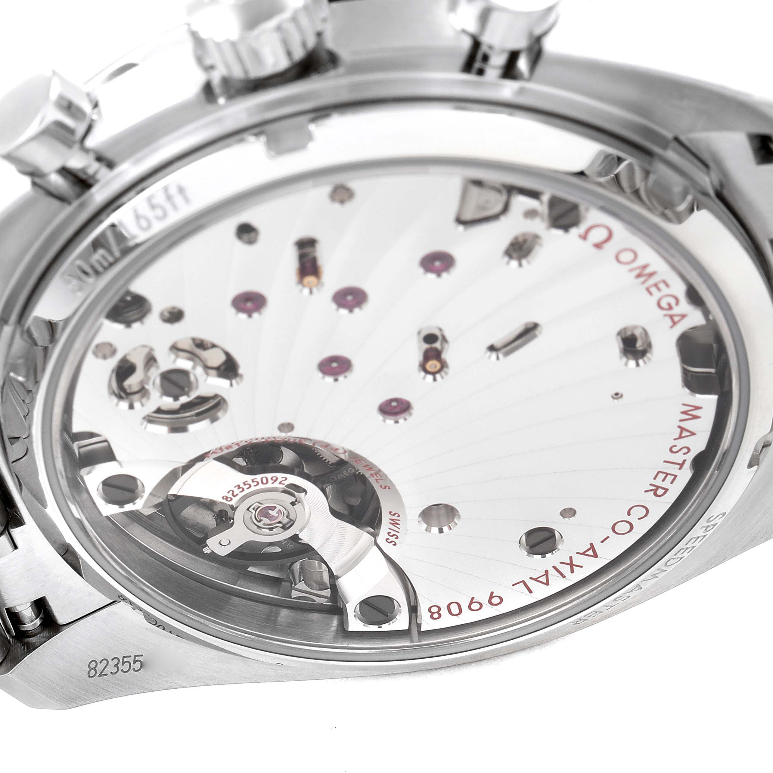 The image shows the case back of an Omega Speedmaster 329.30.43.51.03.001 Men's Stainless Steel Blue Dial 329.30.43.51.03.001 Men's Stainless Steel Blue Dial model, highlighting the movement and internal mechanisms.