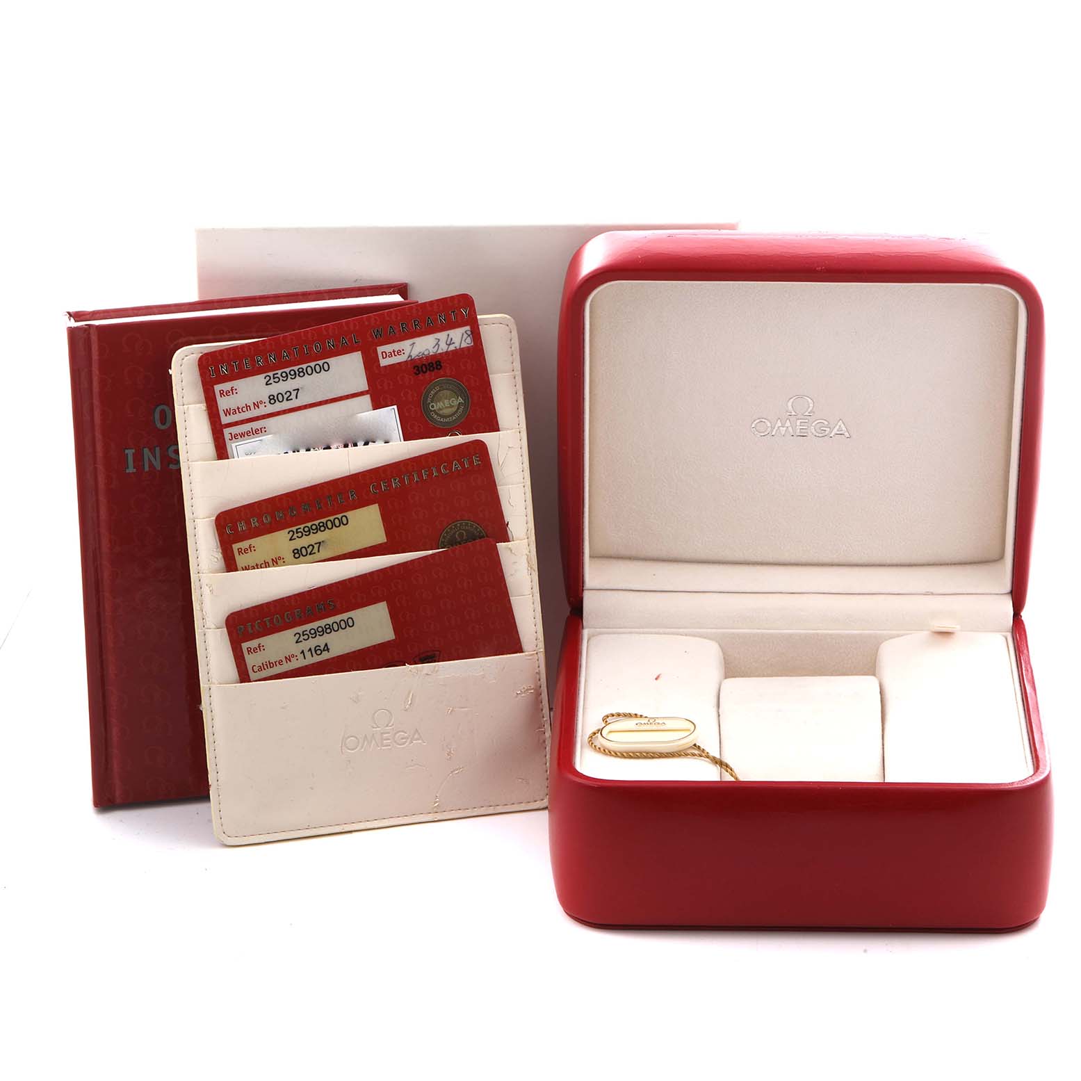 The image shows an Omega Seamaster 2599.80.00 Men
s Stainless Steel Blue Dial 2599.80.00 Men
s Stainless Steel Blue Dial box, paperwork, and cards, with the box open and displaying card slots.