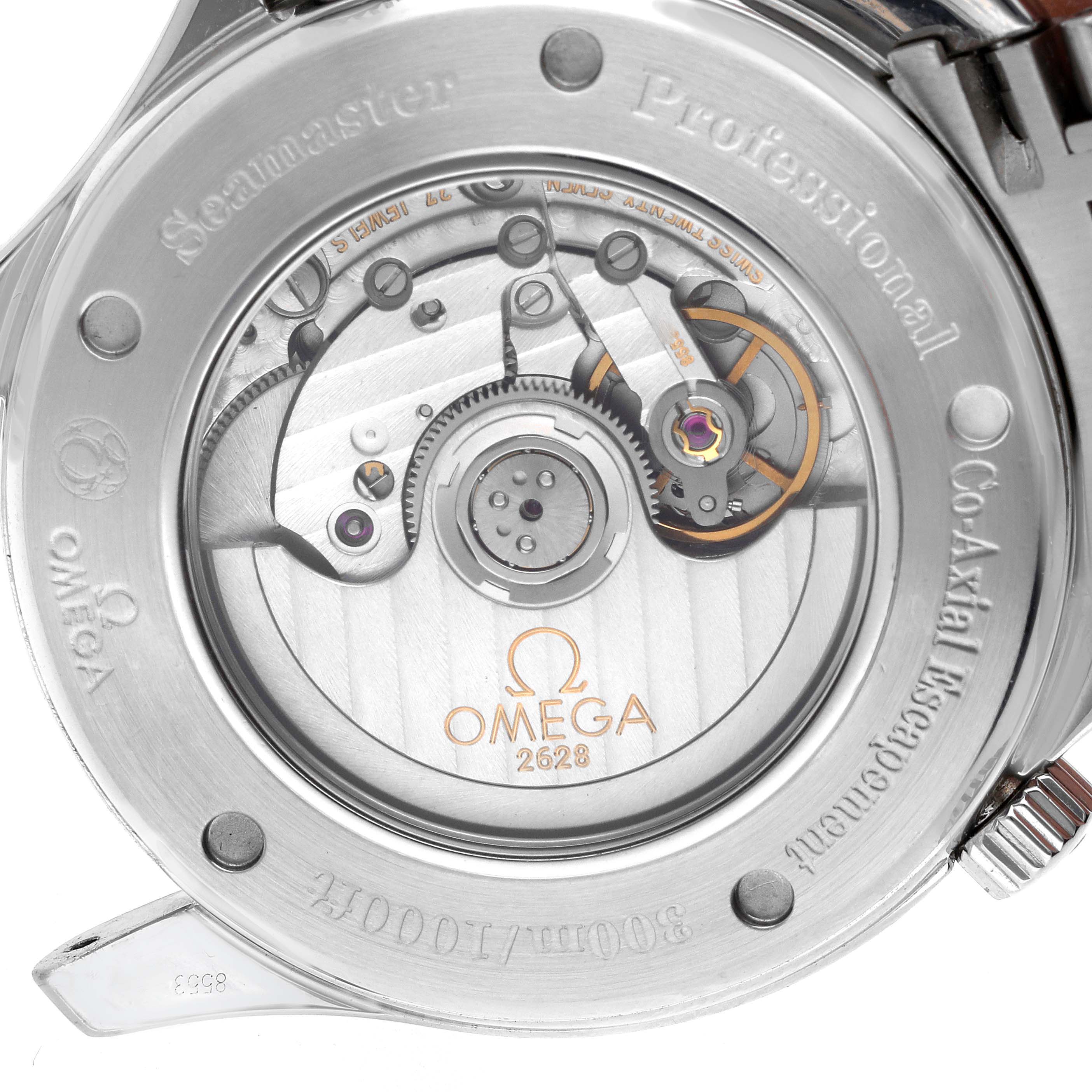 The image shows the rear view of an Omega Seamaster 2535.80.00 Men
s Stainless Steel Blue Dial 2535.80.00 Men
s Stainless Steel Blue Dial, highlighting its mechanical movement and engraved details.