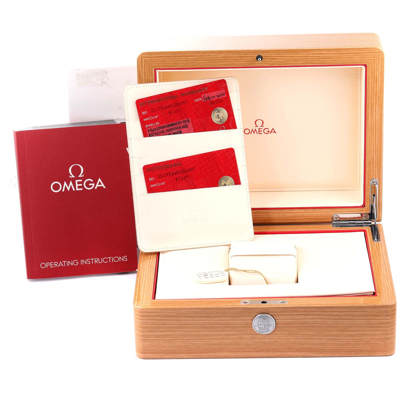 This image shows the box, warranty cards, and operating instructions for an Omega Speedmaster 311.92.44.51.01.007 Men's Ceramic Black Dial 311.92.44.51.01.007 Men's Ceramic Black Dial watch.