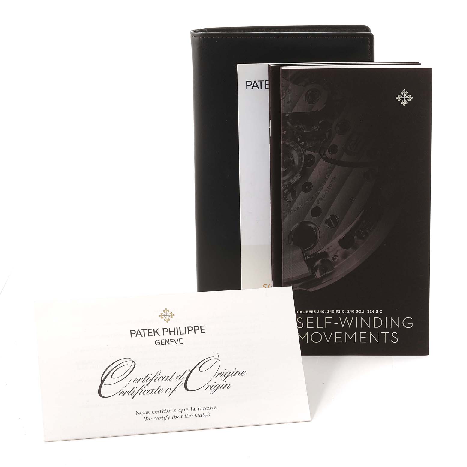 This image shows the Patek Philippe Calatrava 5227J-001 Men's Yellow Gold Beige Dial 5227J-001 Men's Yellow Gold Beige Dial model's documentation, including the certificate of origin and user manuals.