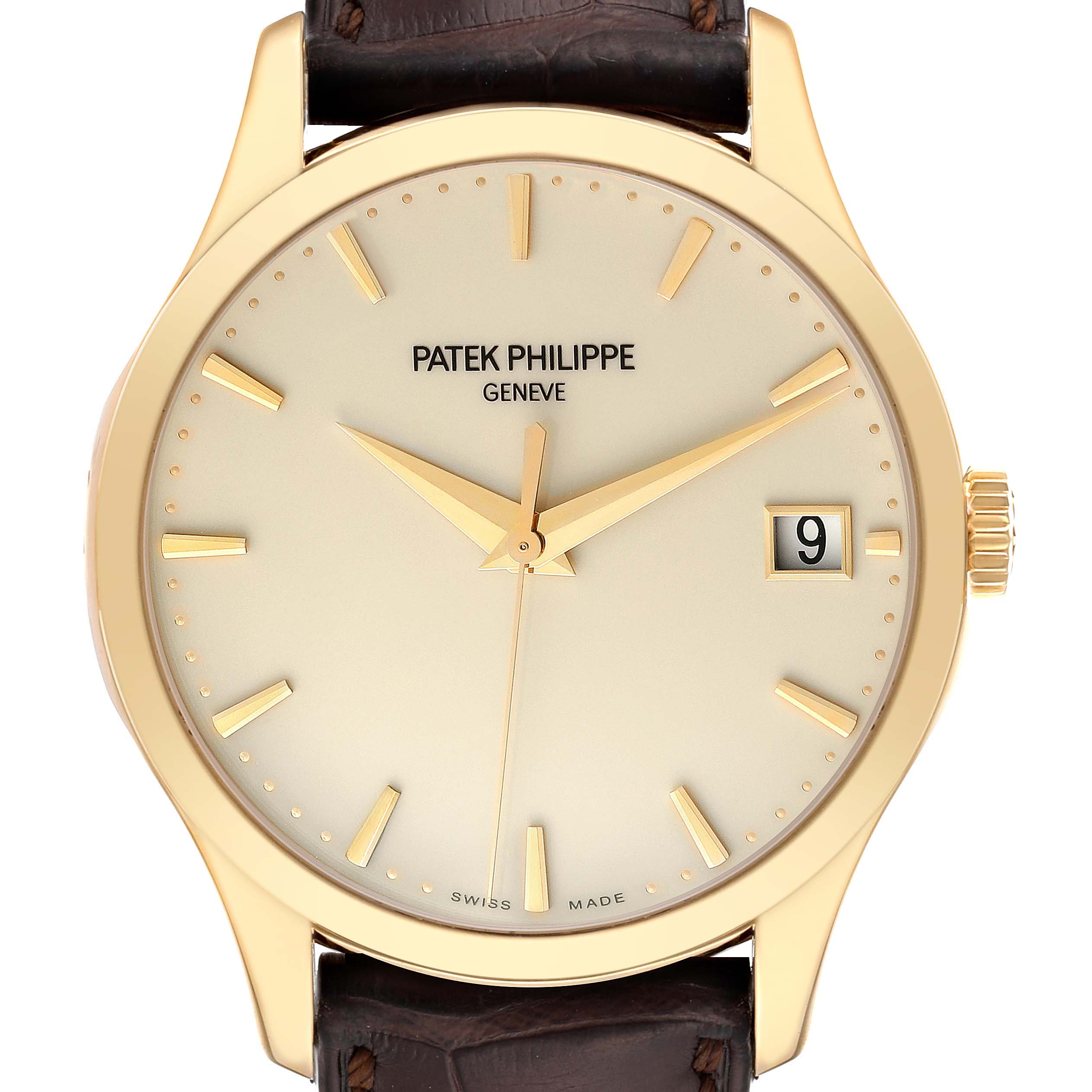 The image shows a front view of a Patek Philippe Calatrava 5227J-001 Men's Yellow Gold Beige Dial 5227J-001 Men's Yellow Gold Beige Dial watch, displaying its face, bezel, crown, and strap attachment.