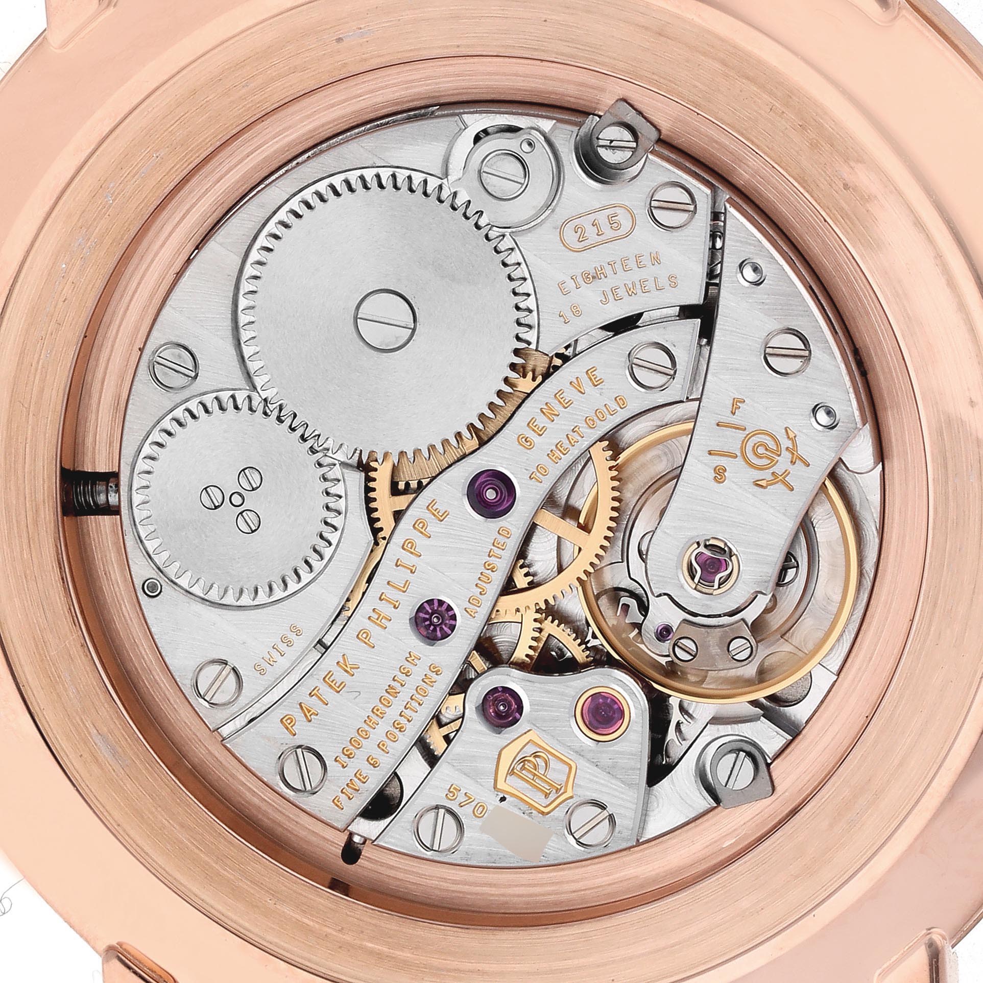 The image shows the intricate movement and internal mechanics of the Patek Philippe Calatrava 5119R Men's Rose Gold White Dial 5119R Men's Rose Gold White Dial watch from a rear angle.