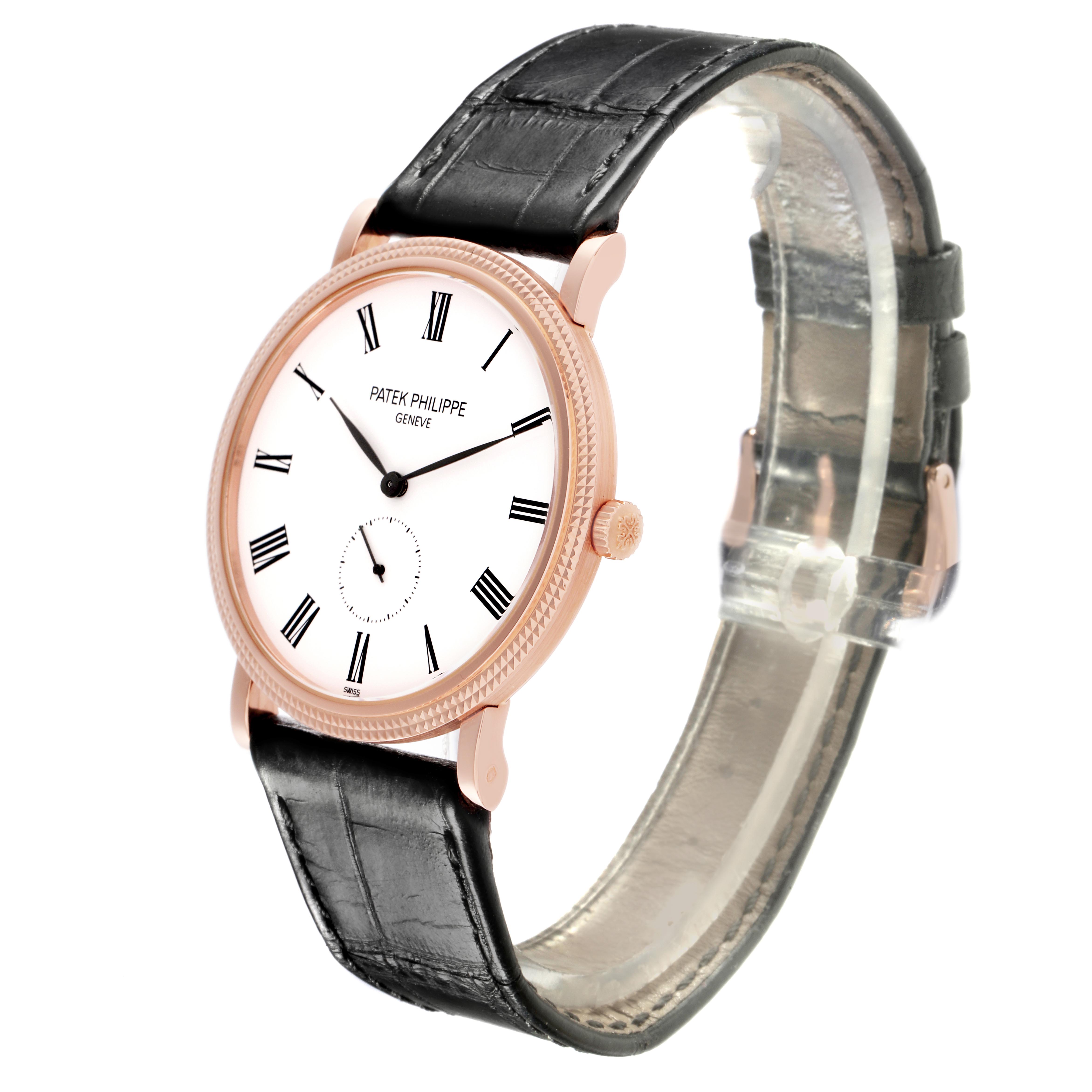 The Patek Philippe Calatrava 5119R Men's Rose Gold White Dial 5119R Men's Rose Gold White Dial watch is shown at a side angle, highlighting the face, crown, and leather strap.