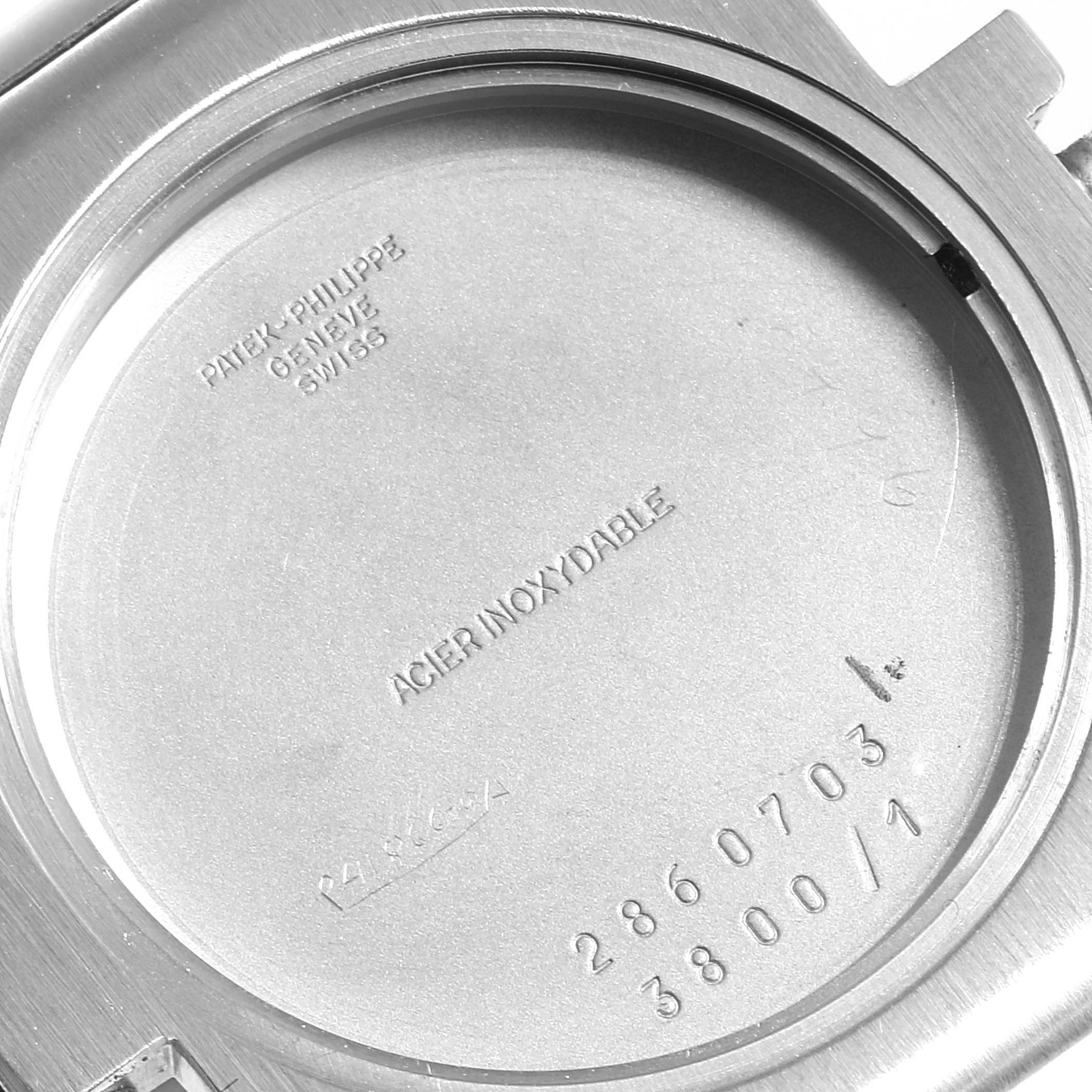 The image shows the inside case back of a Patek Philippe Nautilus 3800/1 Men's Stainless Steel Black Dial 3800/1 Men's Stainless Steel Black Dial watch with model and serial numbers.