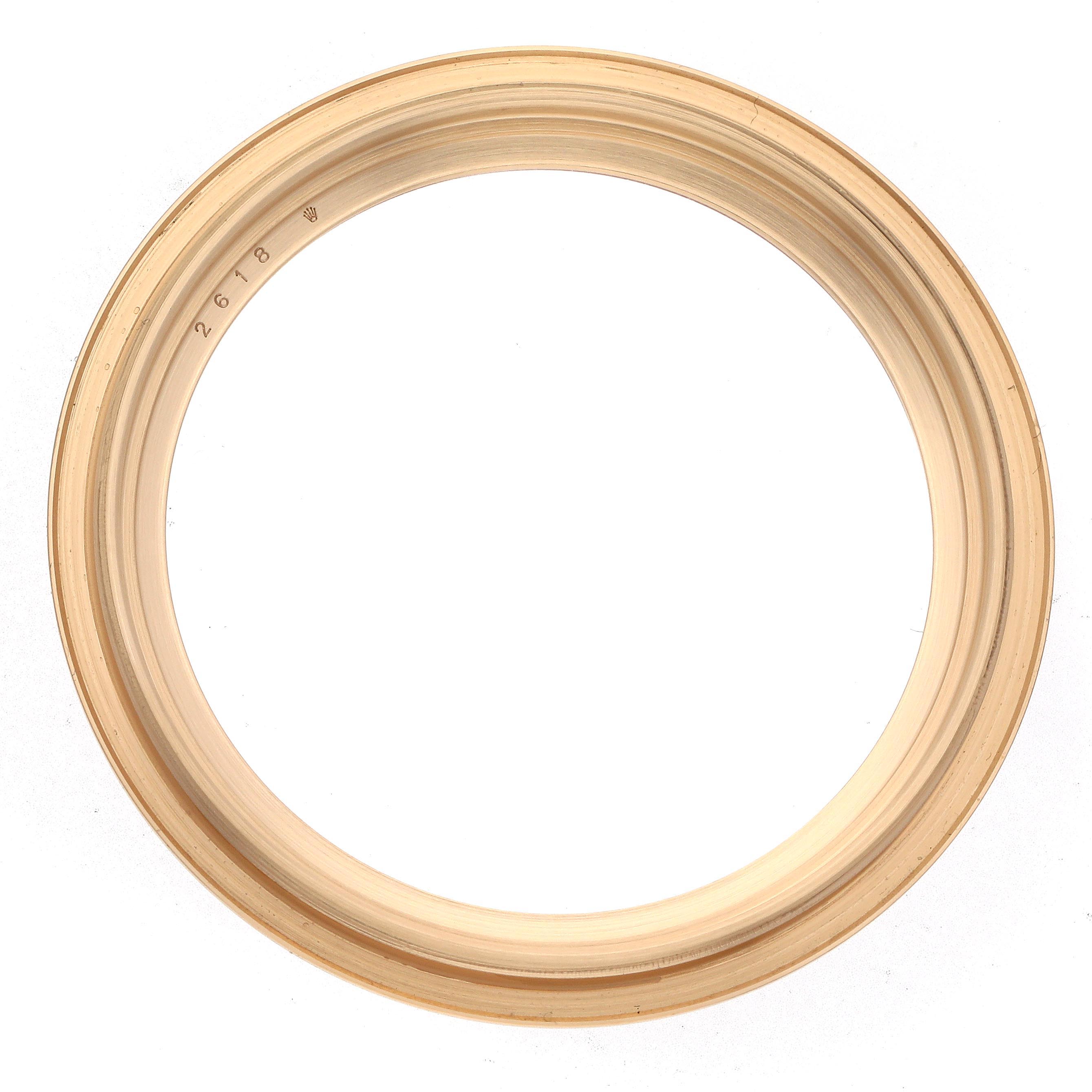 The image shows a bezel from the Rolex 1908 52508-0002 Men
s Yellow Gold Black Dial 52508-0002 Men
s Yellow Gold Black Dial model, viewed from above.