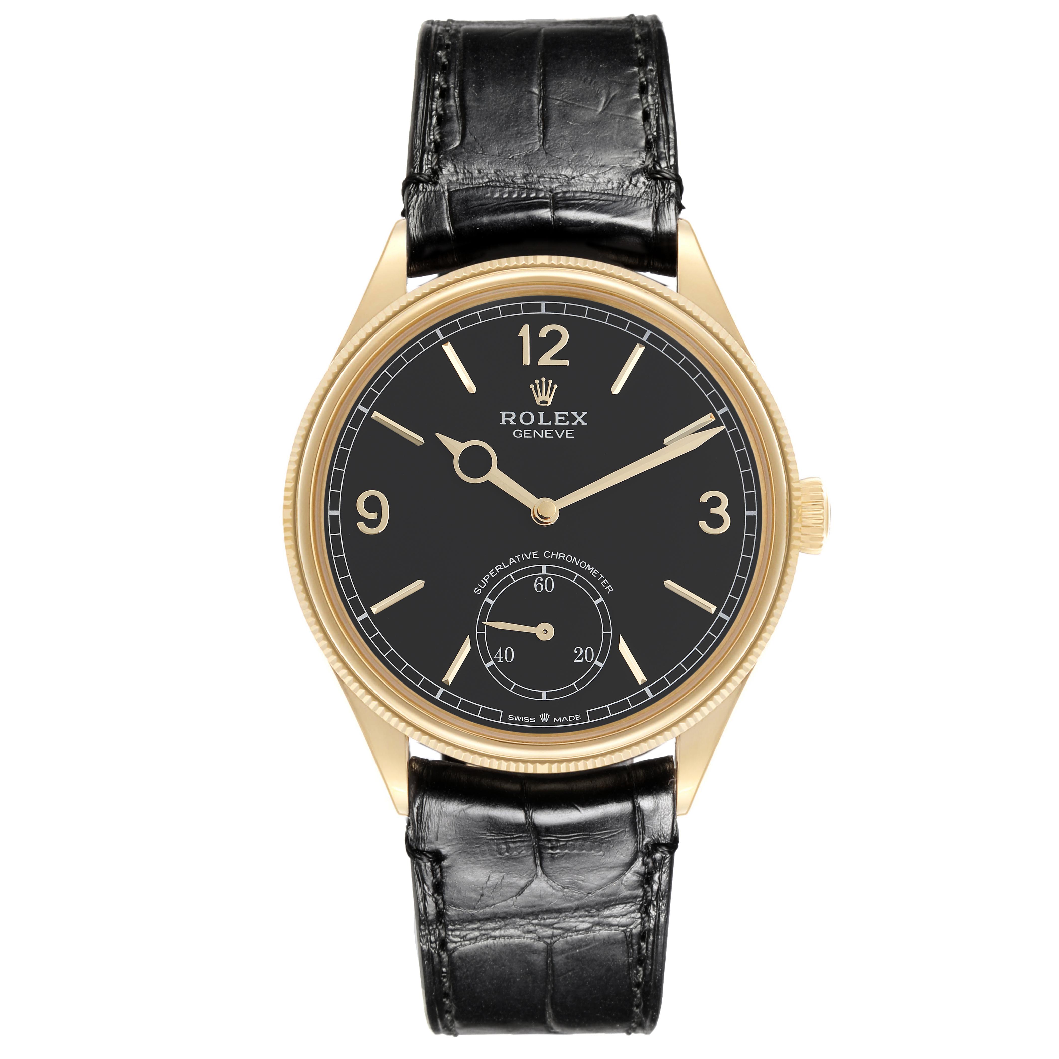 The Rolex 1908 52508-0002 Men
s Yellow Gold Black Dial 52508-0002 Men
s Yellow Gold Black Dial watch is shown from a front angle, displaying the dial, case, and leather strap.