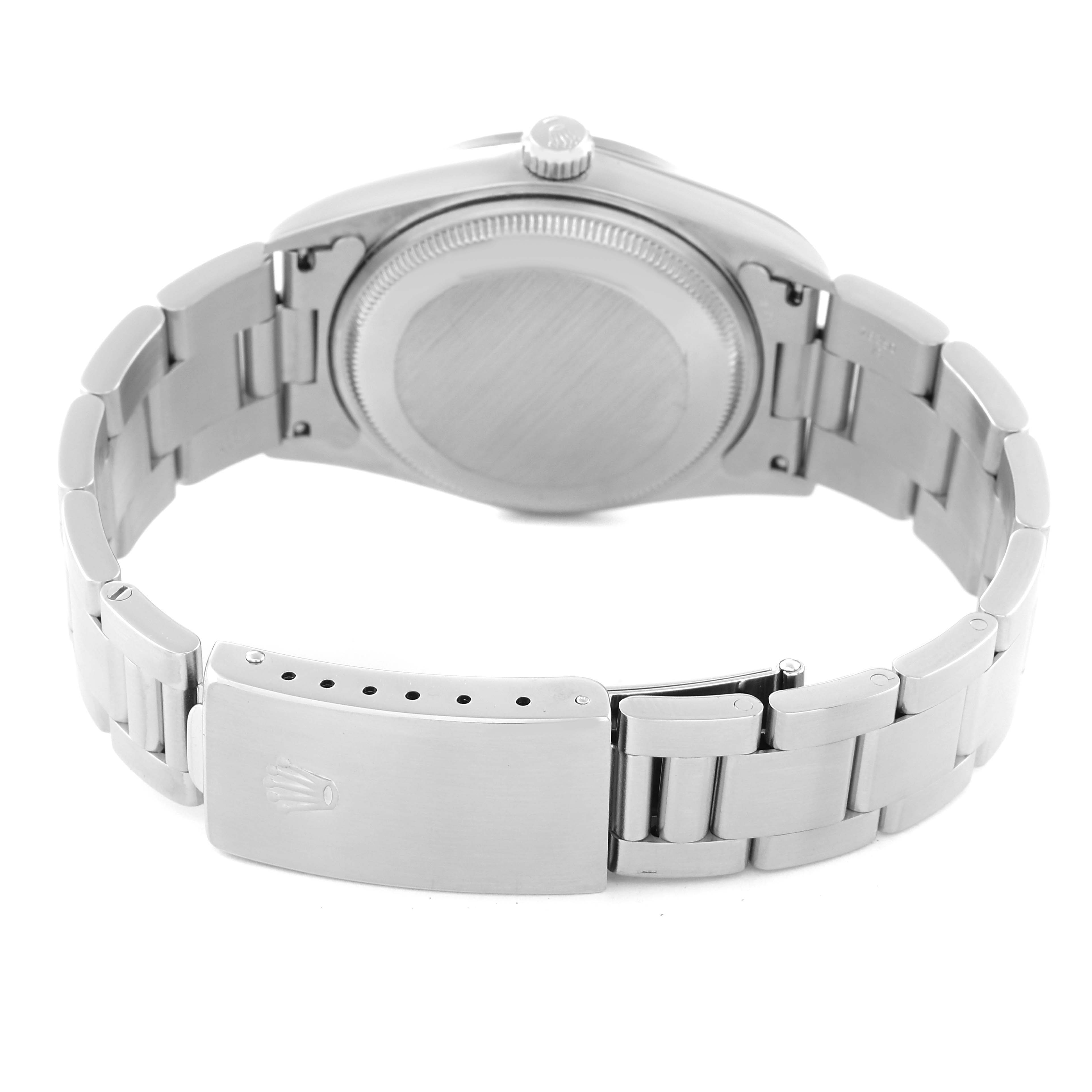 The Rolex Air-King 14000 Men's Stainless Steel Black Dial 14000 Men's Stainless Steel Black Dial watch is shown from the back, displaying the case back, crown, and partially opened bracelet clasp.