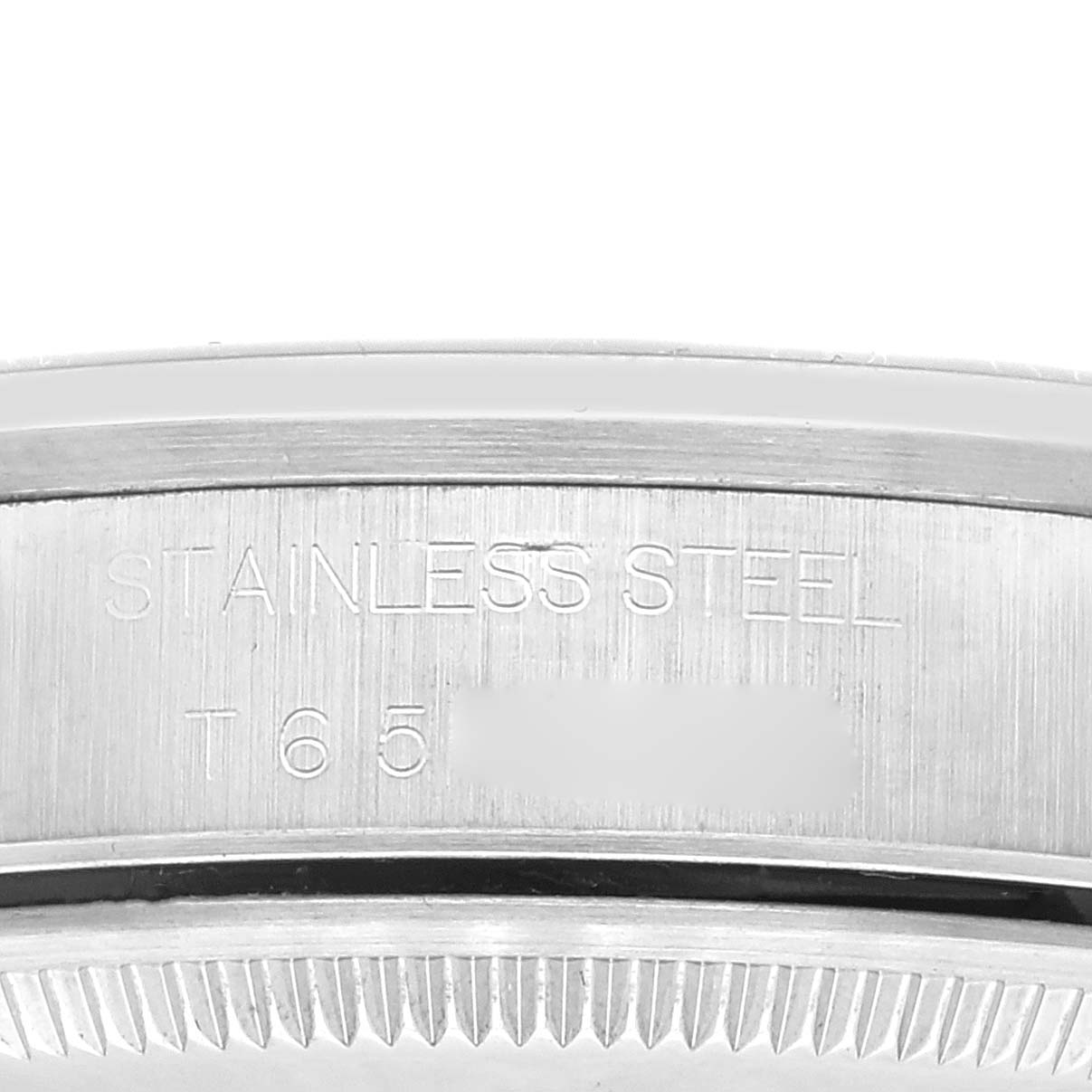 This close-up image shows the side of the bezel and case of a Rolex Air-King 14000 Men's Stainless Steel Black Dial 14000 Men's Stainless Steel Black Dial watch, highlighting the stainless steel material.