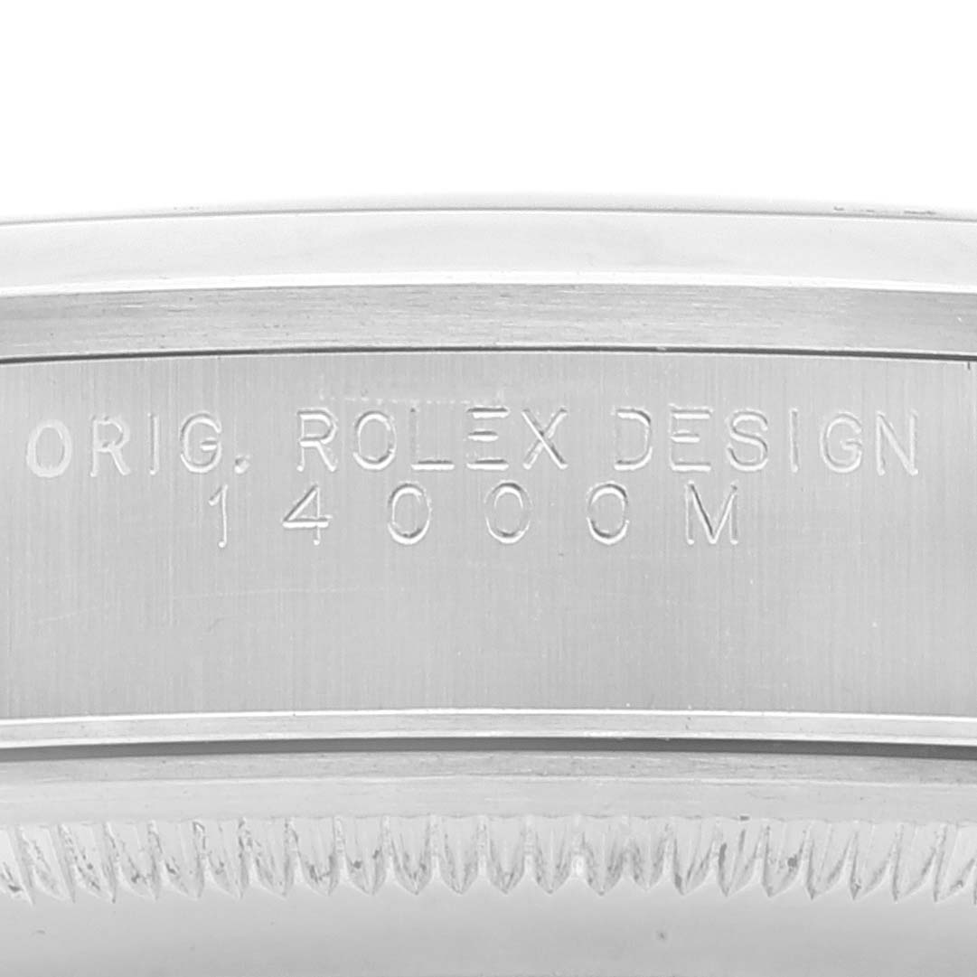 This image shows a close-up of the case side with engraved text on the Rolex Air-King 14000 Men's Stainless Steel Blue Dial 14000 Men's Stainless Steel Blue Dial watch.