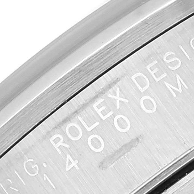This image shows a close-up of the engraving on the side of a Rolex Air-King 14000 Men's Stainless Steel Blue Dial 14000 Men's Stainless Steel Blue Dial watch case.