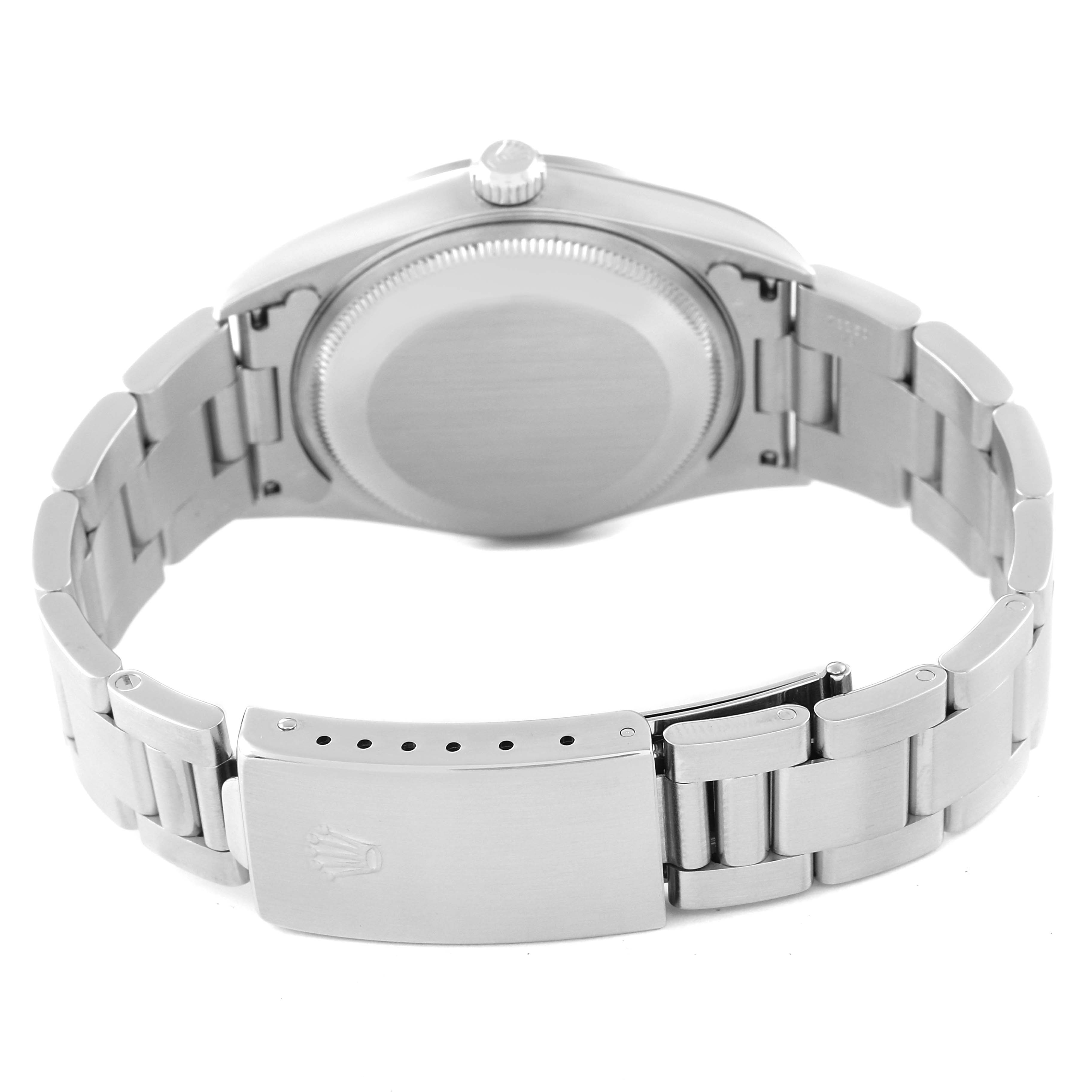 This image shows the back view of a Rolex Air-King 14000 Men's Stainless Steel Blue Dial 14000 Men's Stainless Steel Blue Dial watch, highlighting its clasp and stainless steel bracelet.