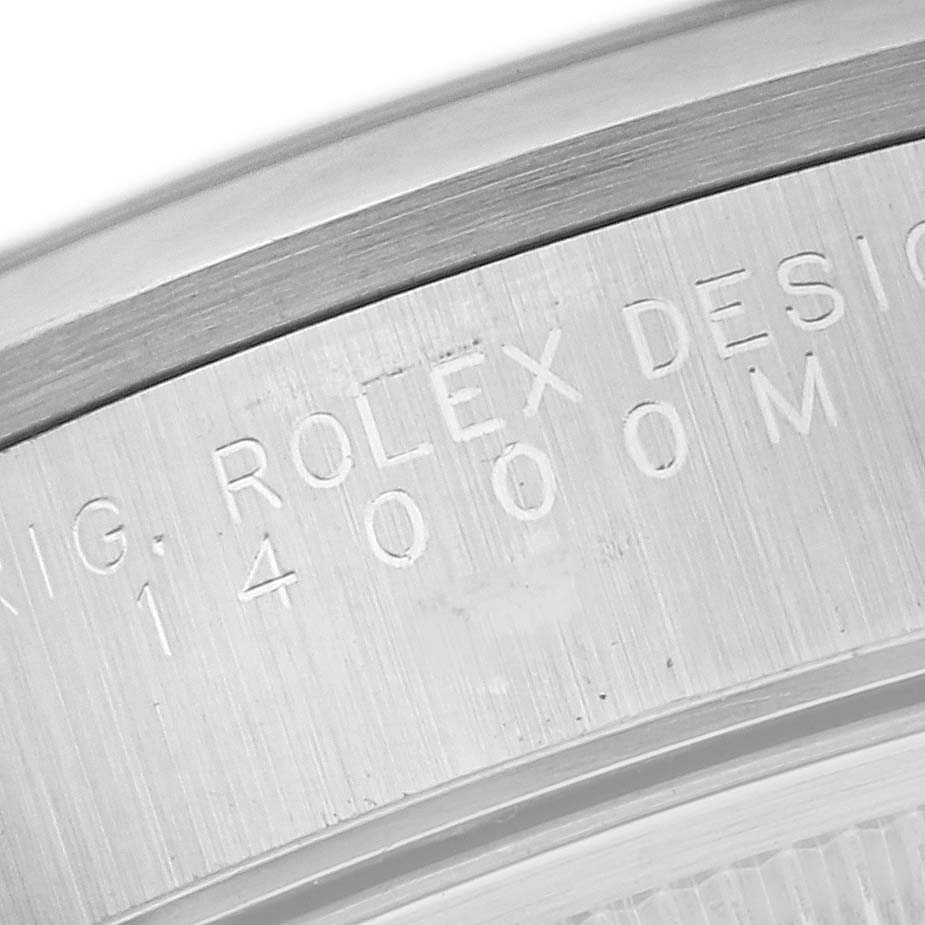 This image shows a close-up view of the engraved caseback of a Rolex Air-King 14000 Men's Stainless Steel Black Dial 14000 Men's Stainless Steel Black Dial watch.