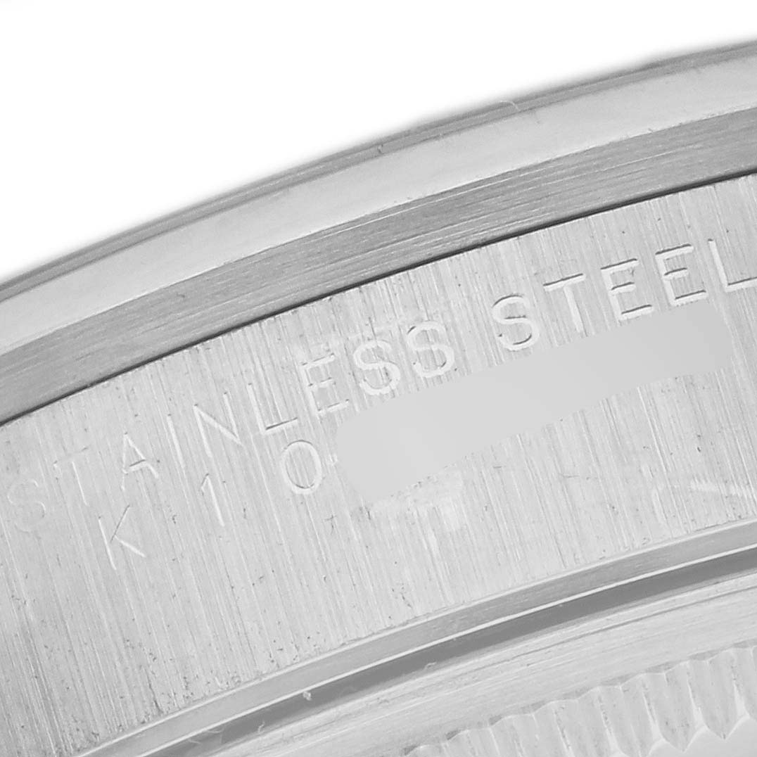 The image shows a close-up of the engraved text on the stainless steel casing of a Rolex Air-King 14000 Men's Stainless Steel Black Dial 14000 Men's Stainless Steel Black Dial watch.