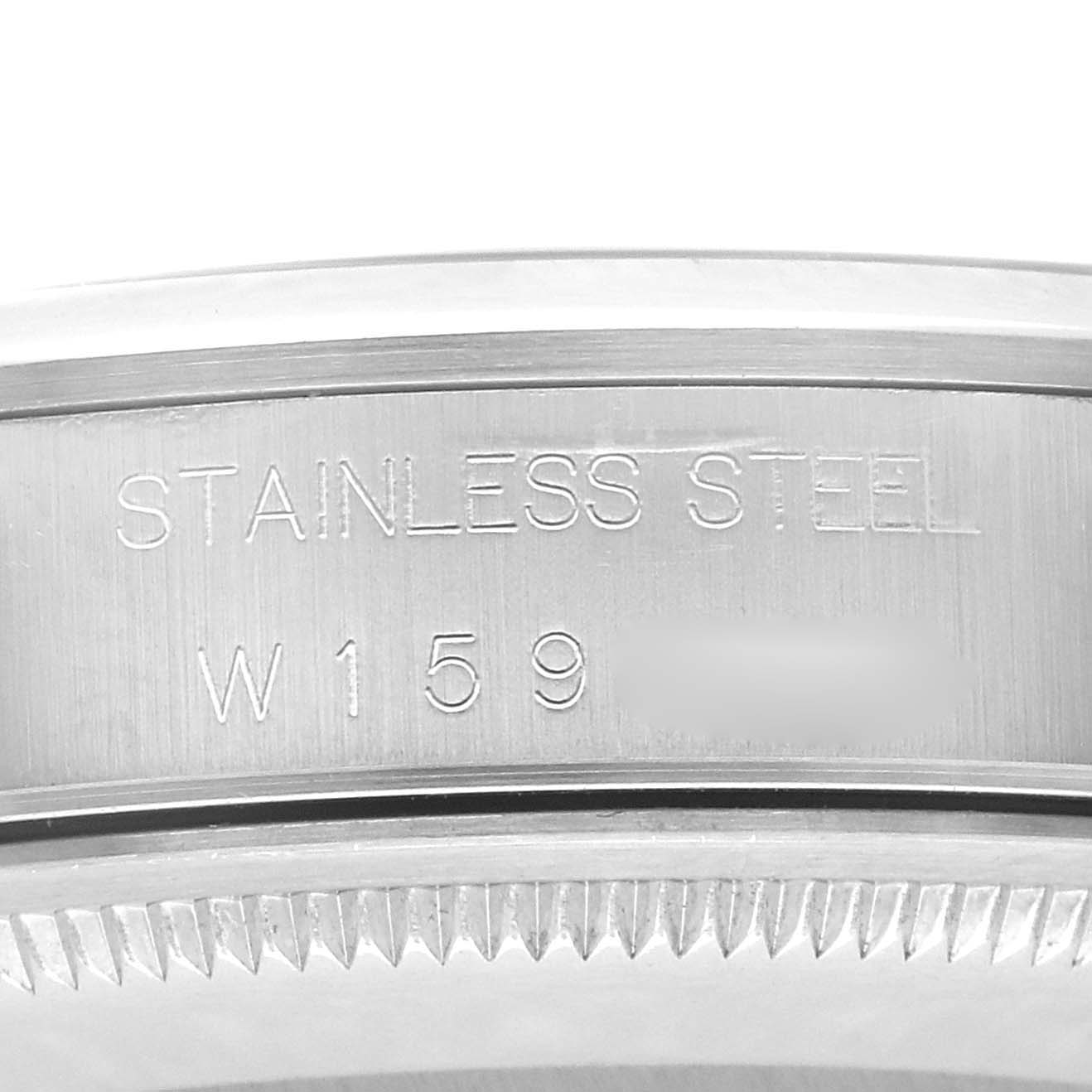 The close-up image shows the stainless steel part of a Rolex Air-King 14000 Men's Stainless Steel Black Dial 14000 Men's Stainless Steel Black Dial watch with its serial number.