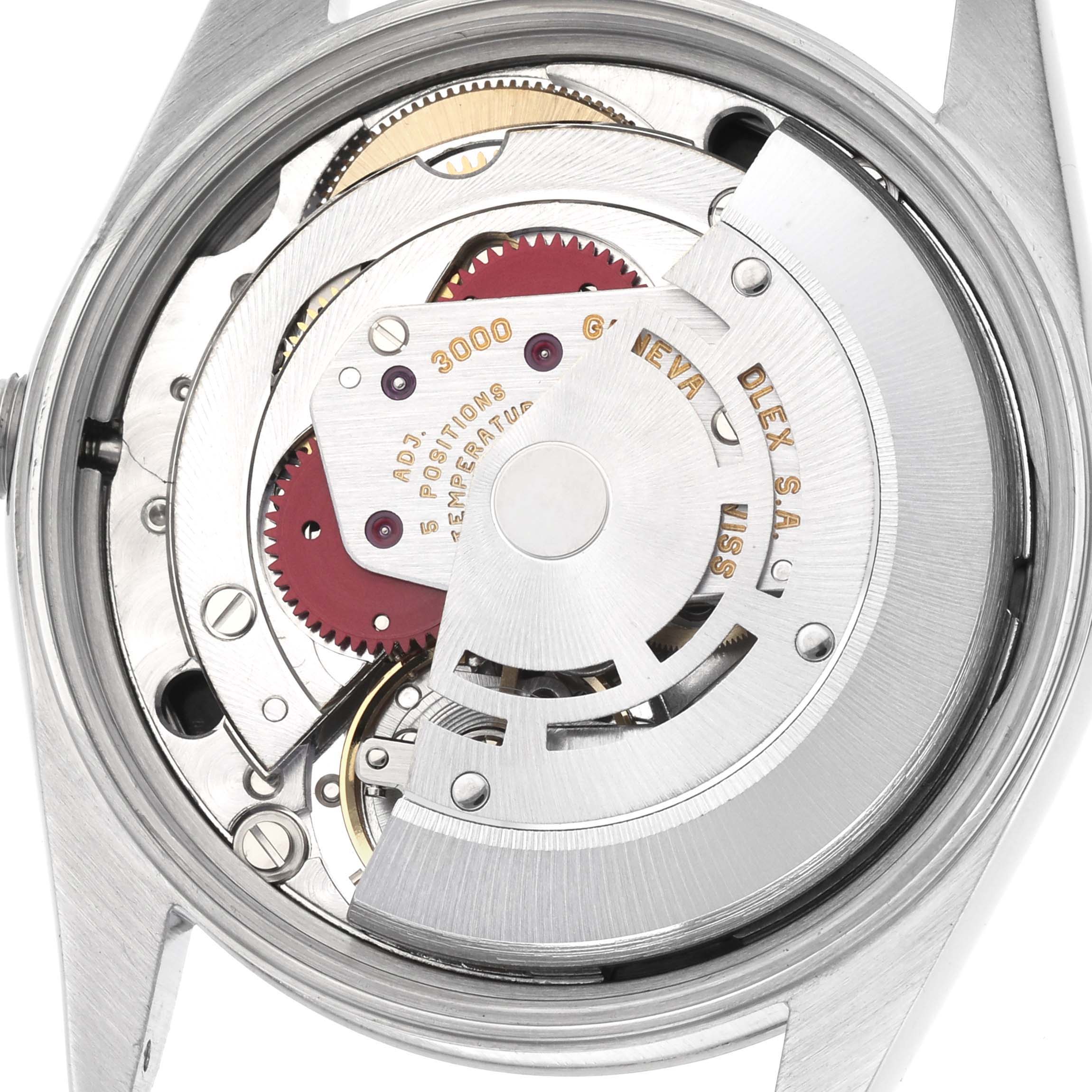 This image shows the internal mechanism of a Rolex Air-King 14000 Men's Stainless Steel Black Dial 14000 Men's Stainless Steel Black Dial watch from a top-down angle, highlighting gears and the rotor.