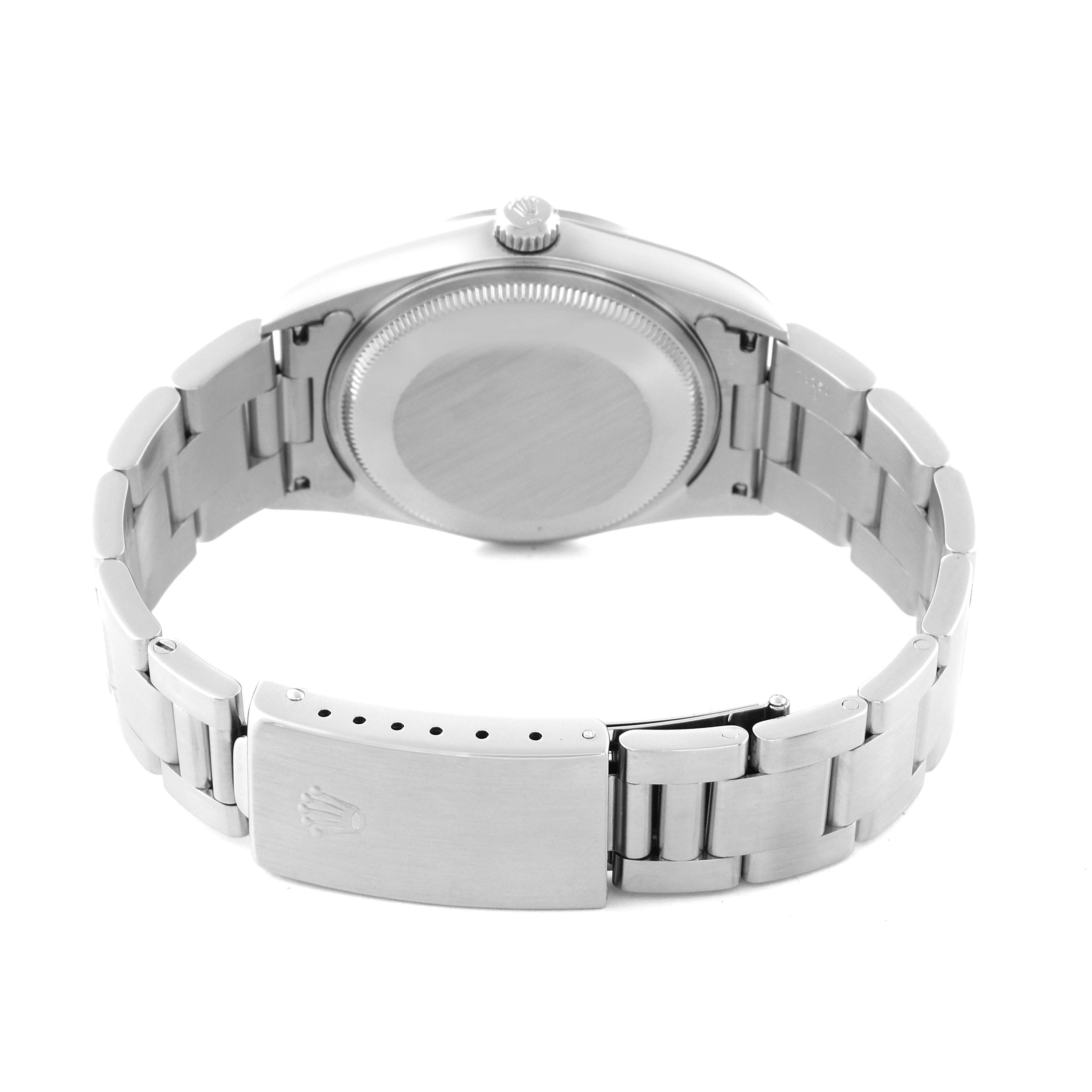 The image shows the back view of a Rolex Air-King 14000 Men's Stainless Steel Silver Dial 14000 Men's Stainless Steel Silver Dial watch, highlighting the case back, crown, and bracelet with clasp.