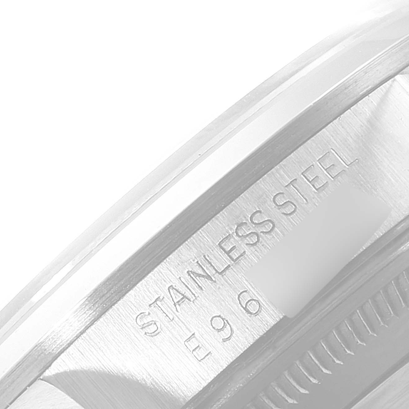 This close-up image shows the engraved stainless steel casing of a Rolex Date 15200 Men's Stainless Steel Black Dial 15200 Men's Stainless Steel Black Dial model watch from a side angle.