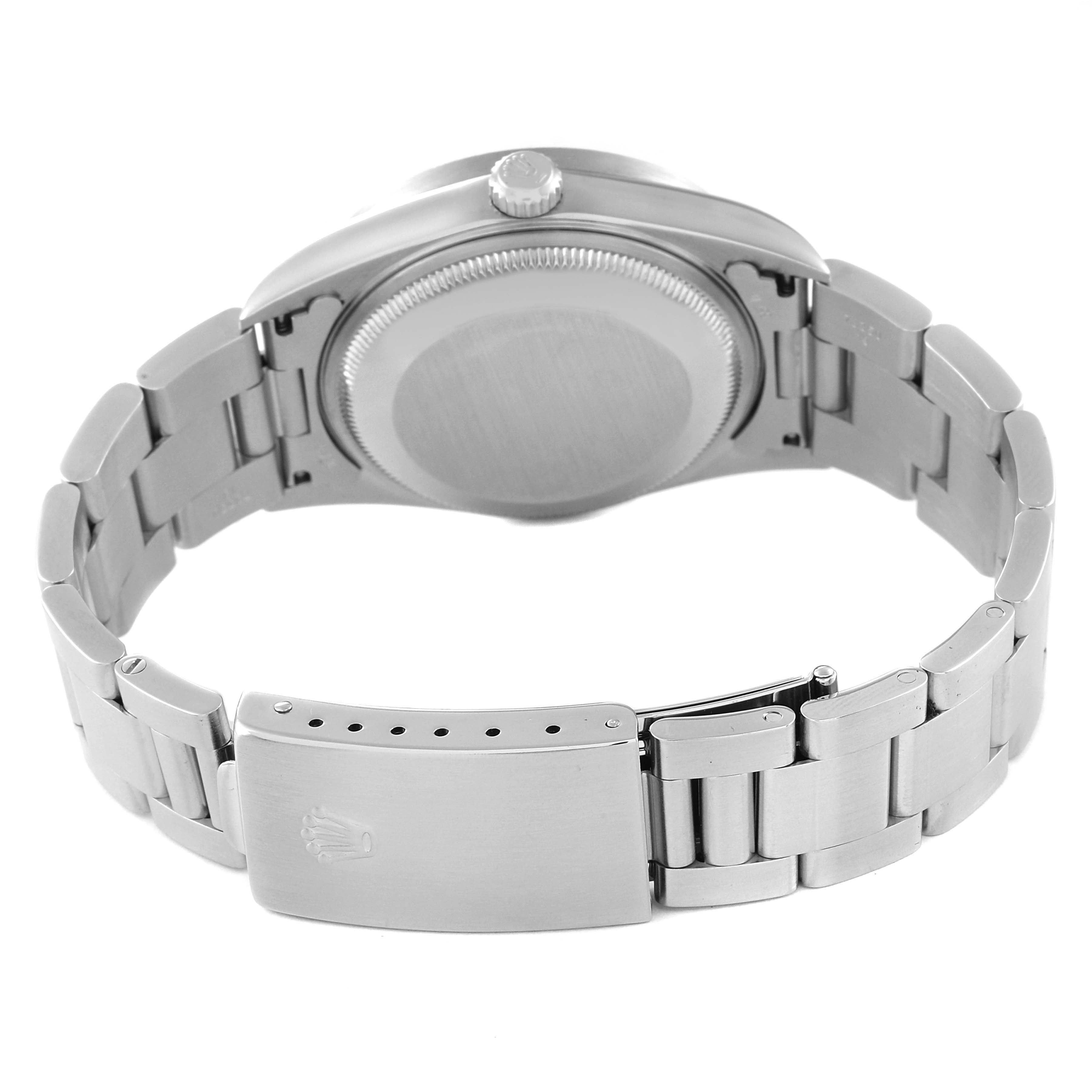 This image shows the back and clasp of a Rolex Date 15210 Men's Stainless Steel Blue Dial 15210 Men's Stainless Steel Blue Dial model watch from a rear angle.