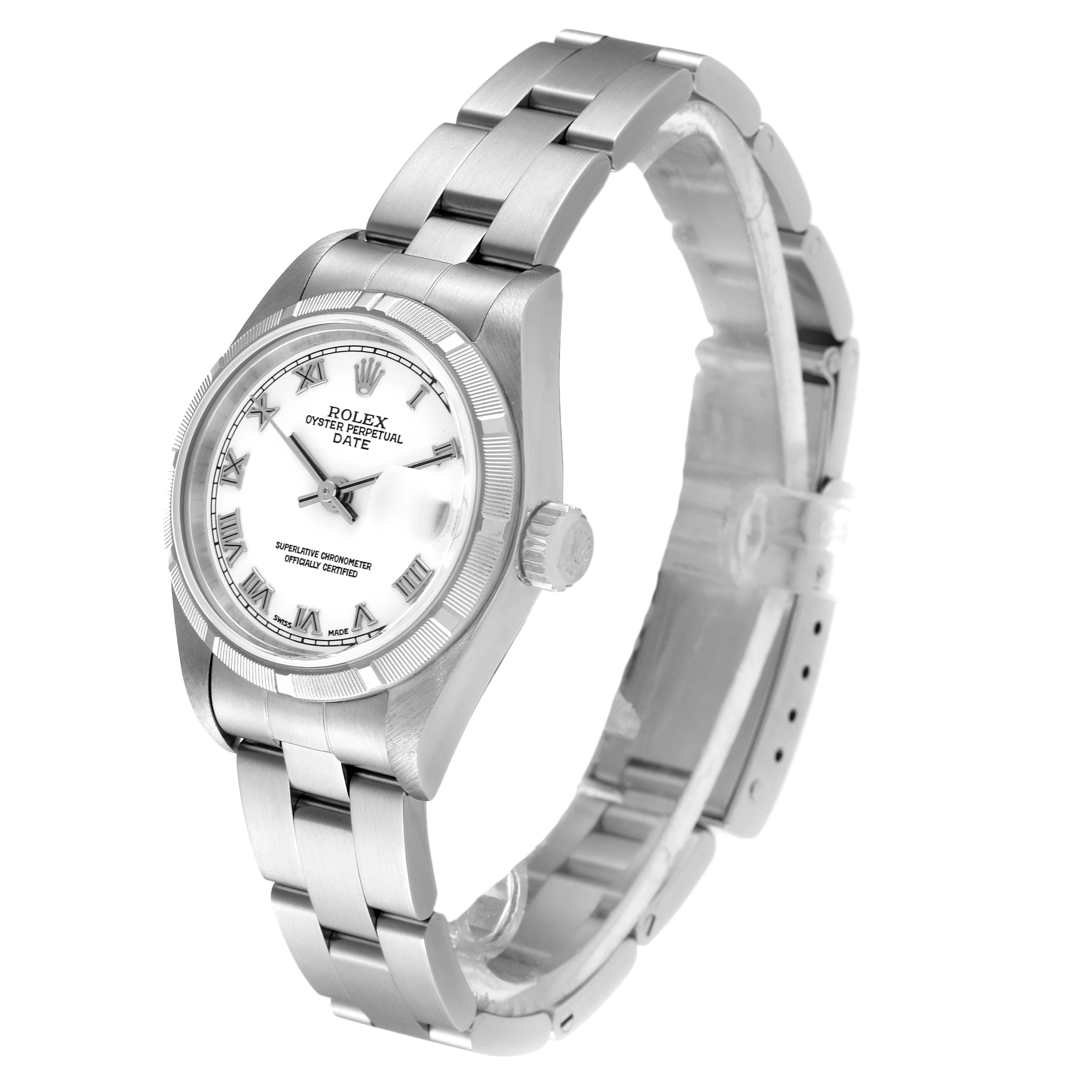 This image shows a Rolex Date 79190 Women's Stainless Steel White Dial 79190 Women's Stainless Steel White Dial model watch from an angle showcasing the face, bezel, crown, and bracelet.