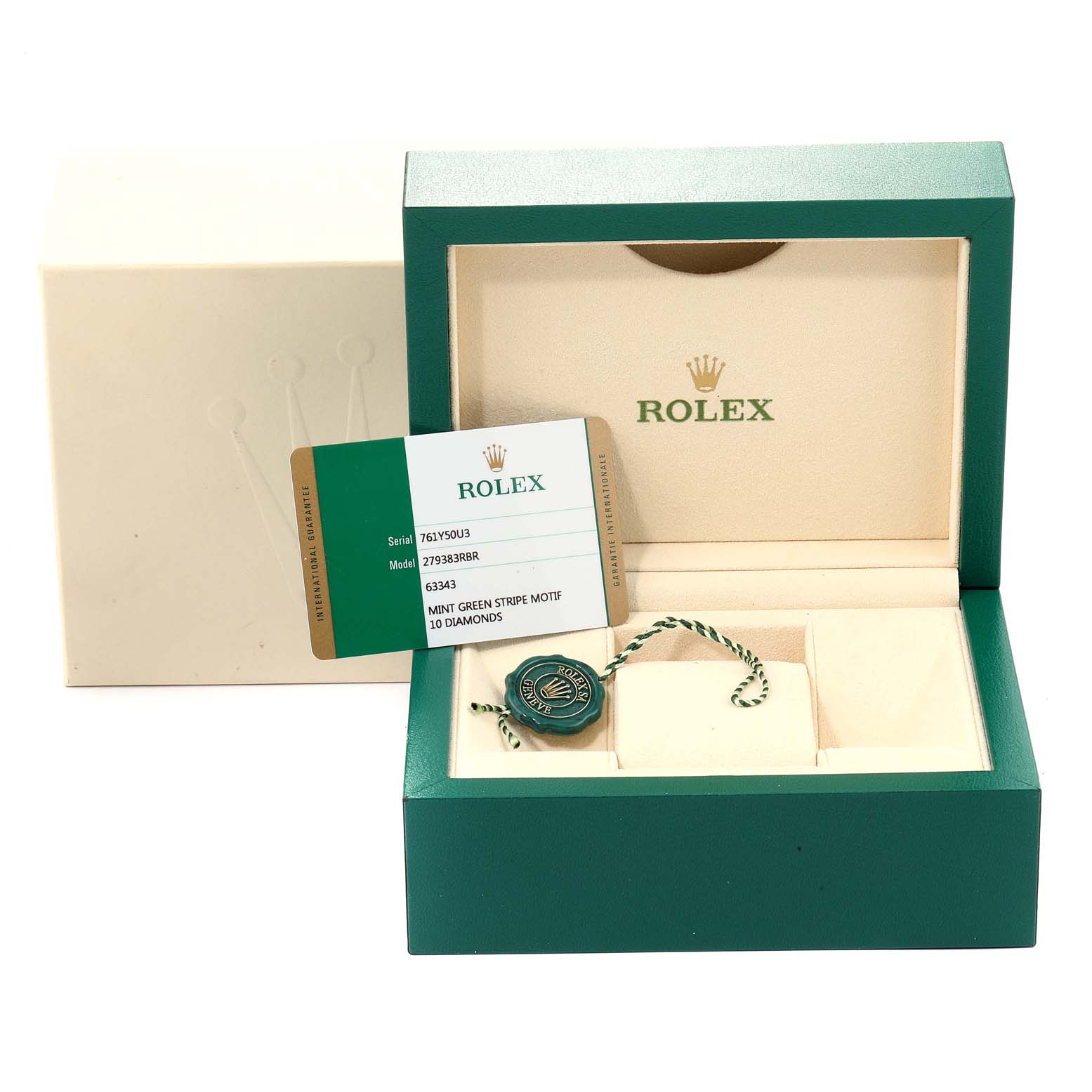 The image shows the Datejust model Rolex watch box, warranty card, and accessories, viewed from the front.